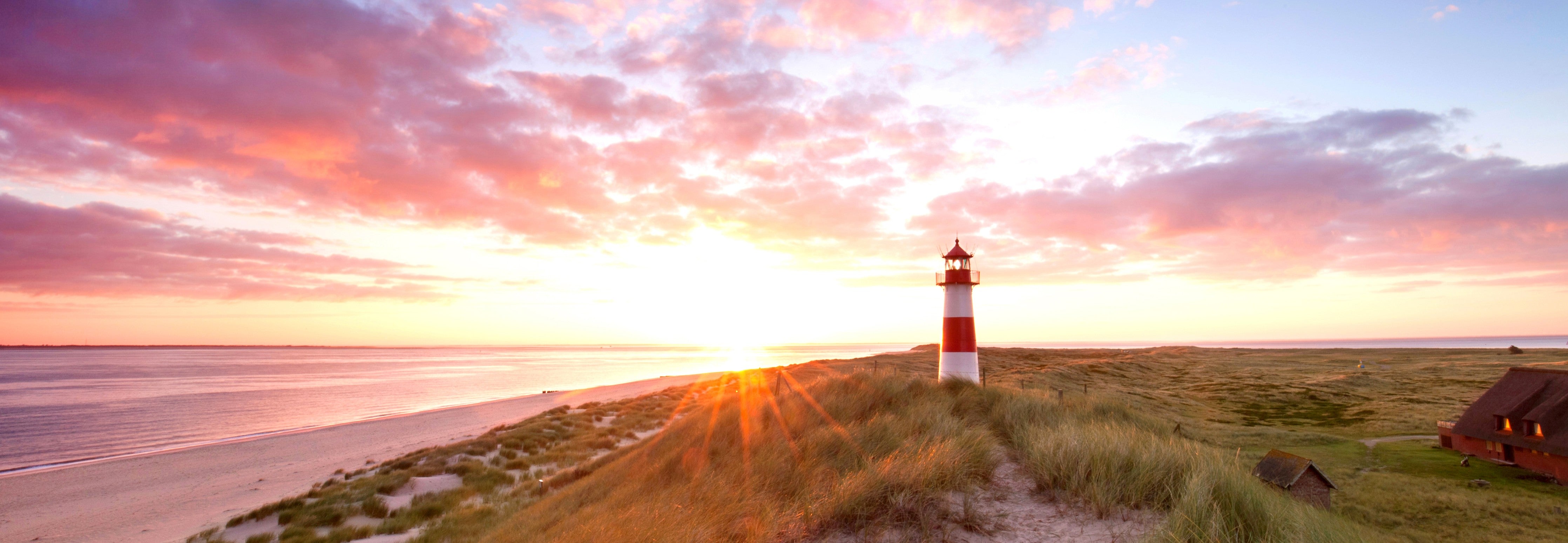 Wandverkleidung Schlafzimmer-Leuchtturm am Strand Sonnenuntergang