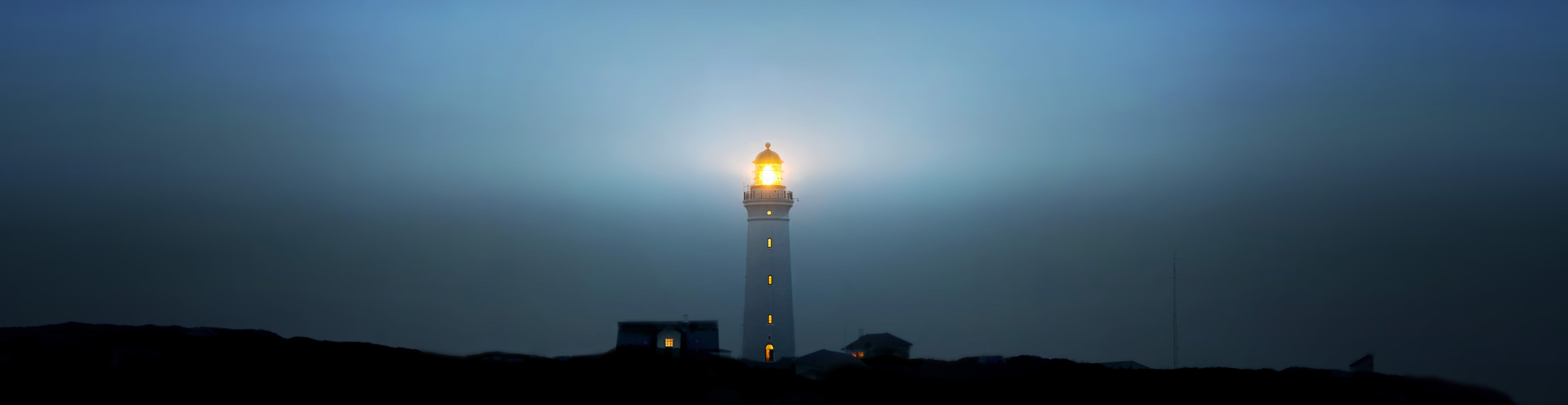Wandverkleidung Schlafzimmer-Leuchtturm bei Nacht am Meer