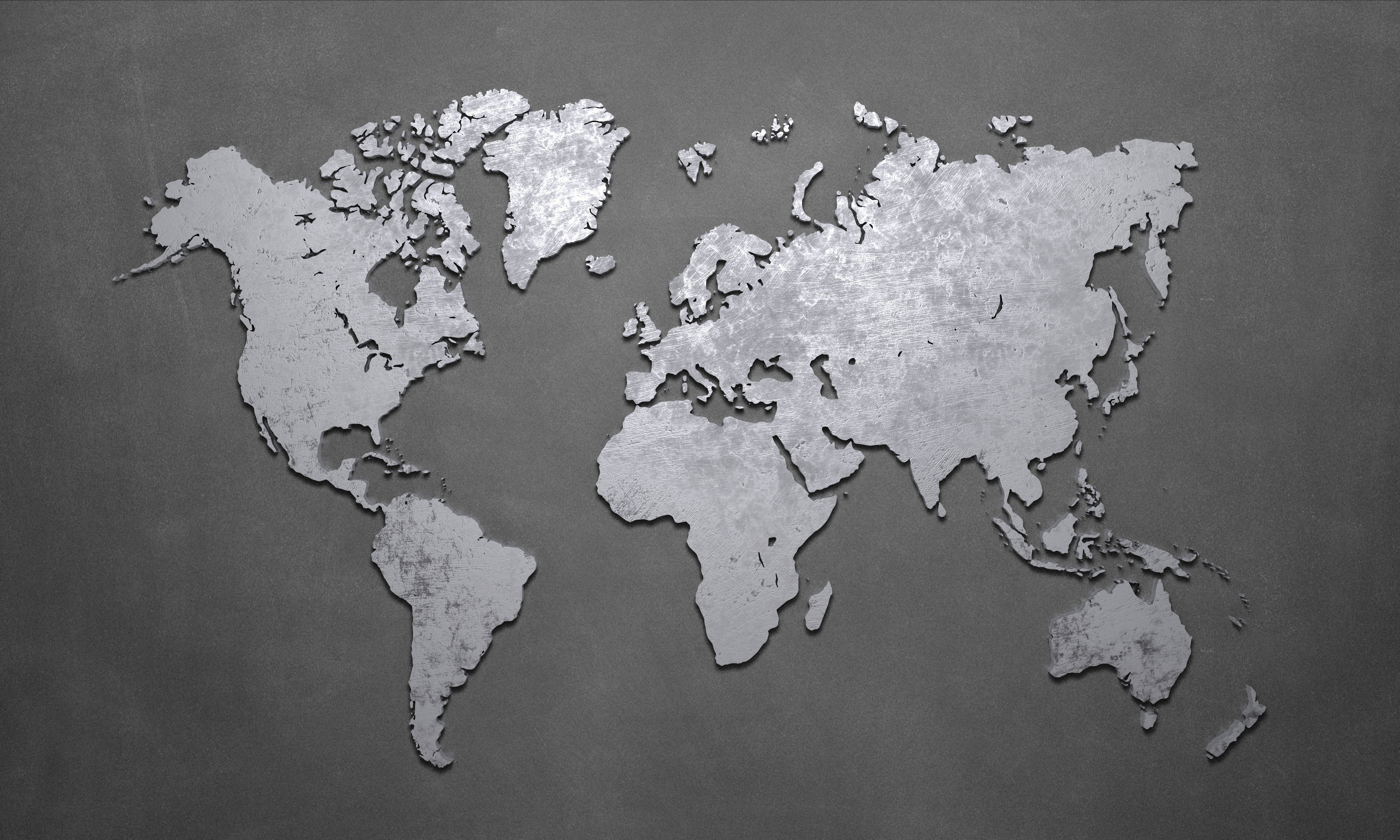 Wandverkleidung Schlafzimmer-Moderne Weltkarte aus Metall auf grauem Hintergrund