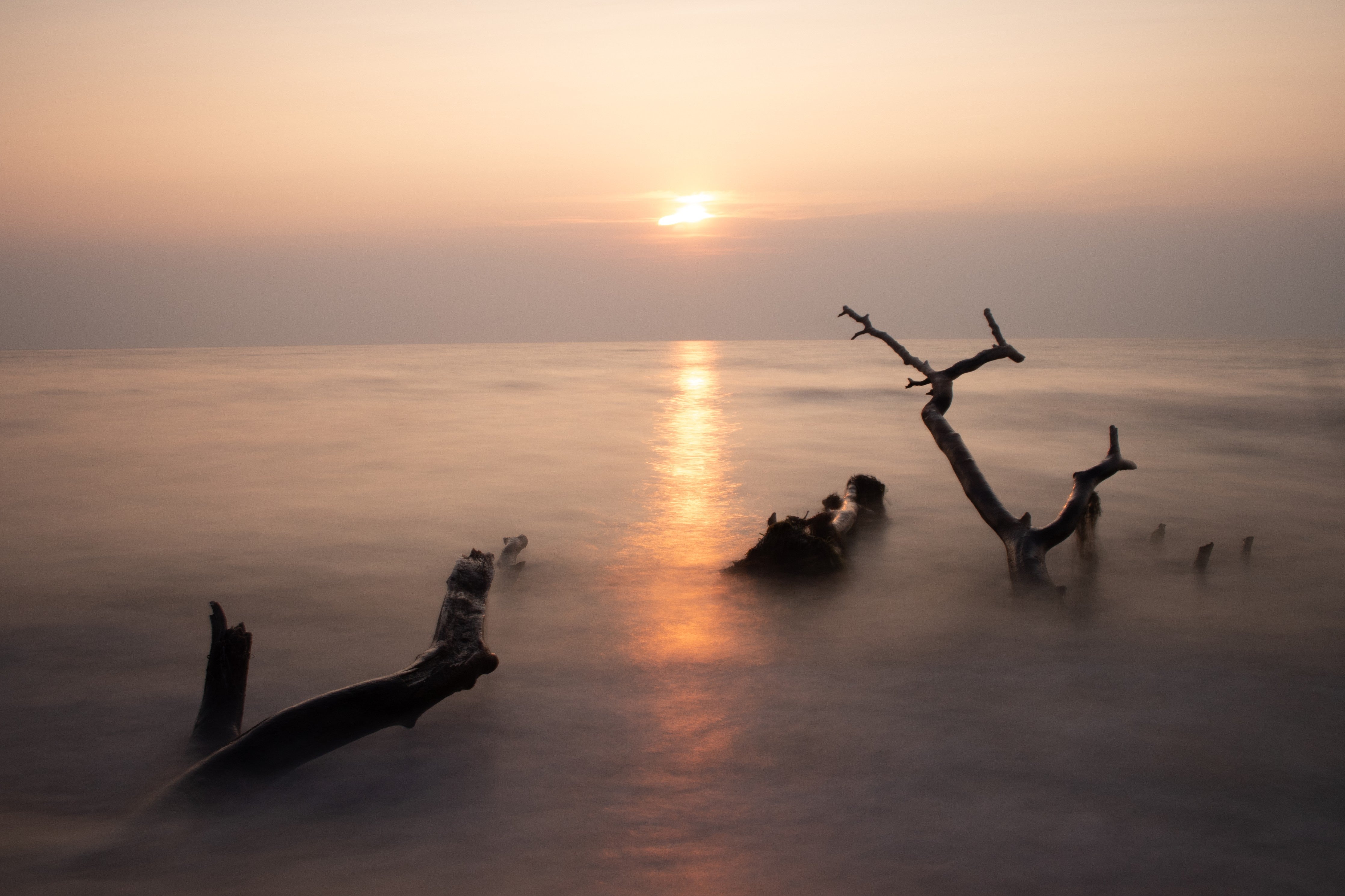 Wandverkleidung Schlafzimmer-Ruhiger Sonnenuntergang am Meer