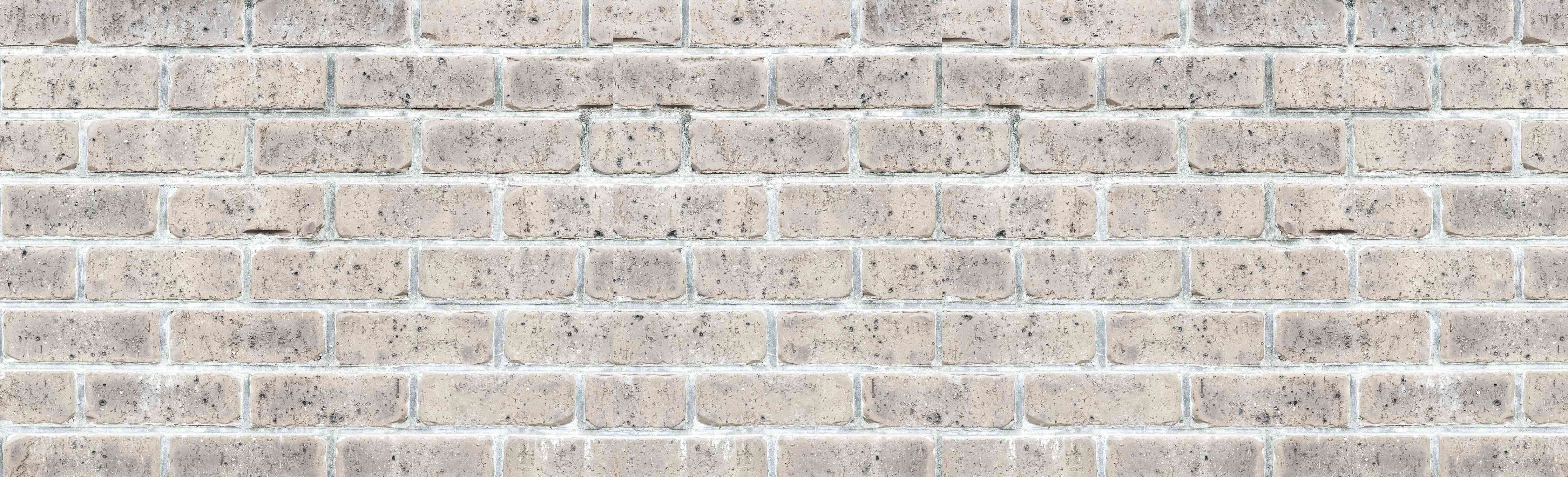 Wandverkleidung Wohnzimmer-Alte weiße Vintage Backsteinmauer