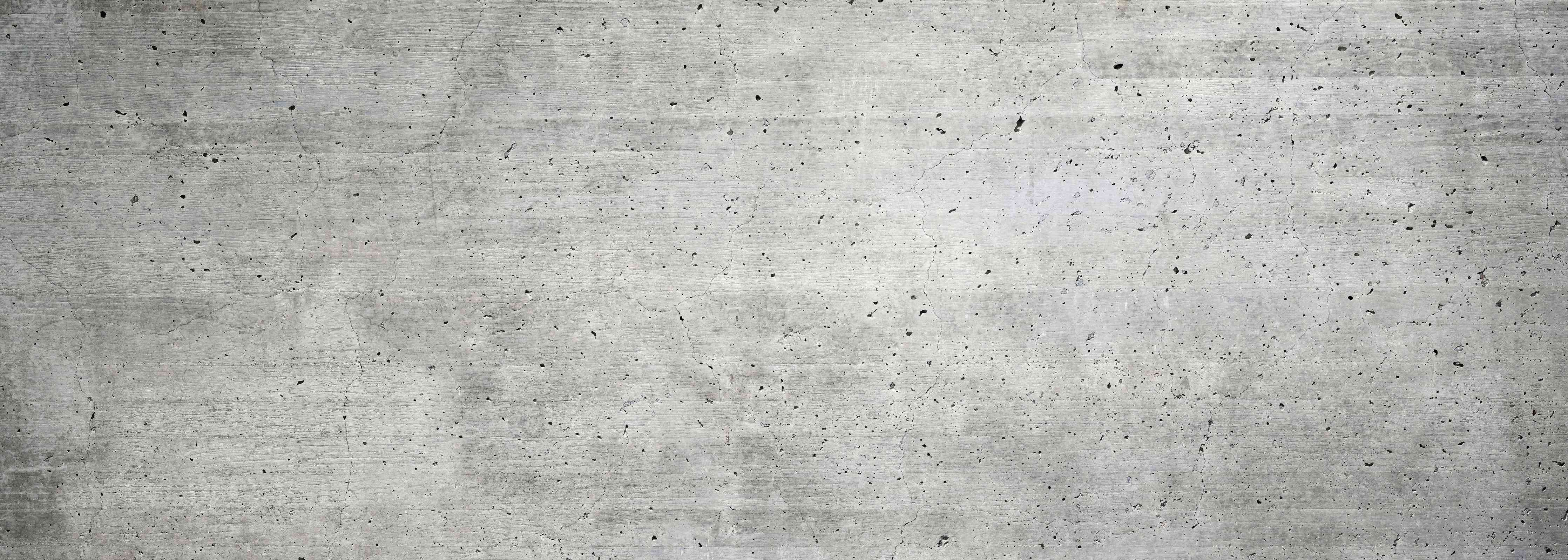 Wandverkleidung Wohnzimmer-Alter gräulicher Beton