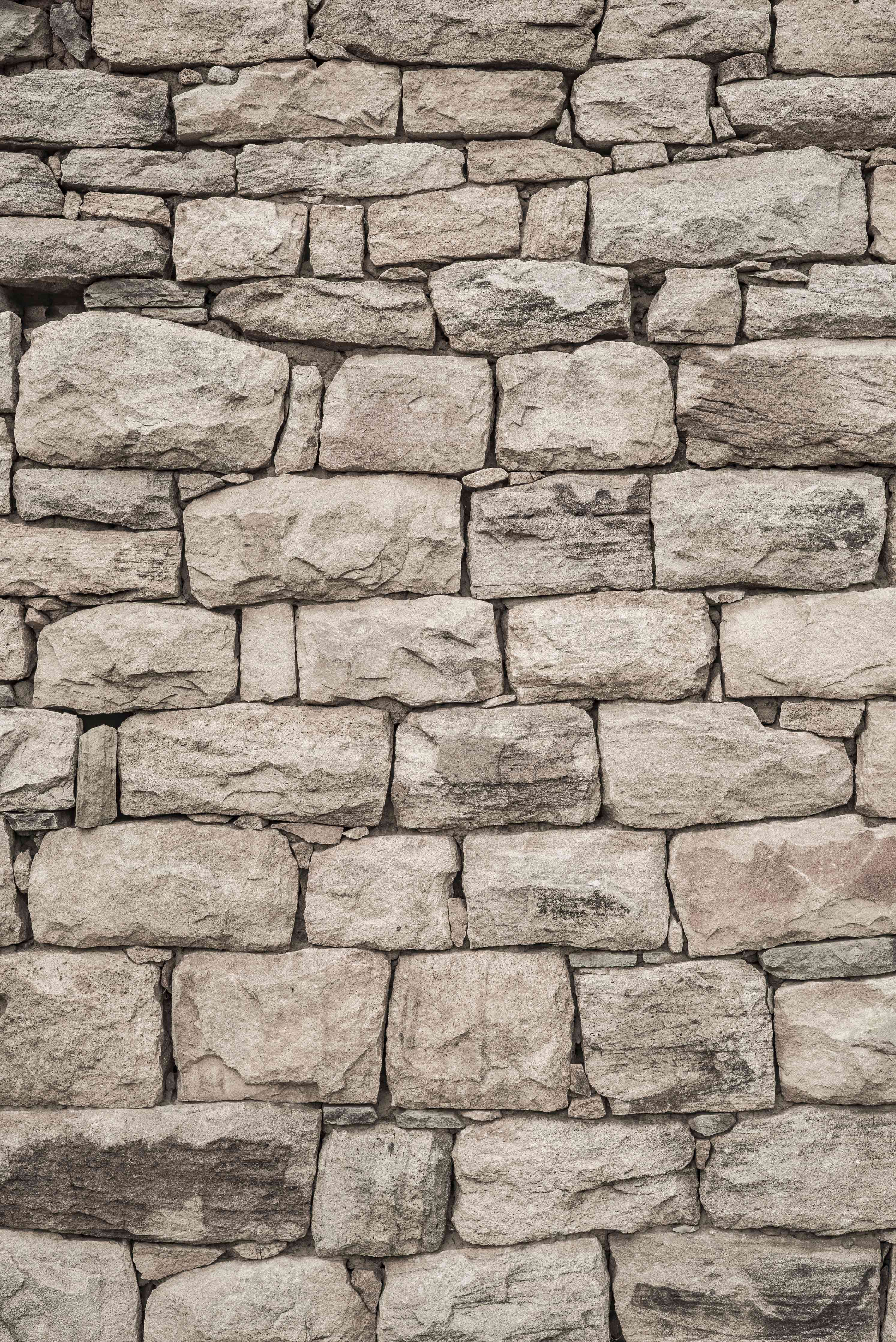 Wandverkleidung Wohnzimmer-Elegante Graunuance Natursteinmauer