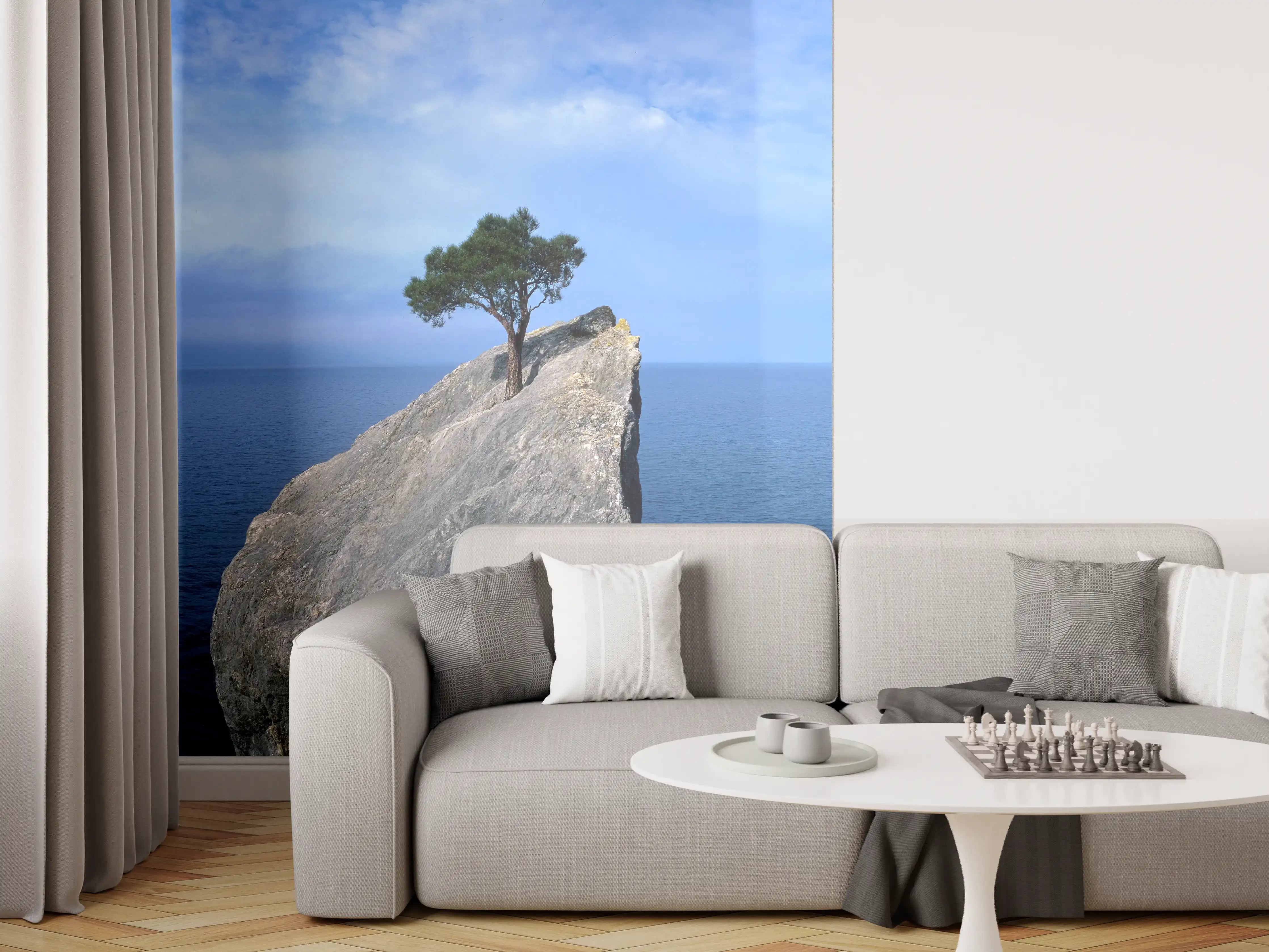 Wandverkleidung Wohnzimmer - Felsen mit Baum vor Meer bei schönem Himmel