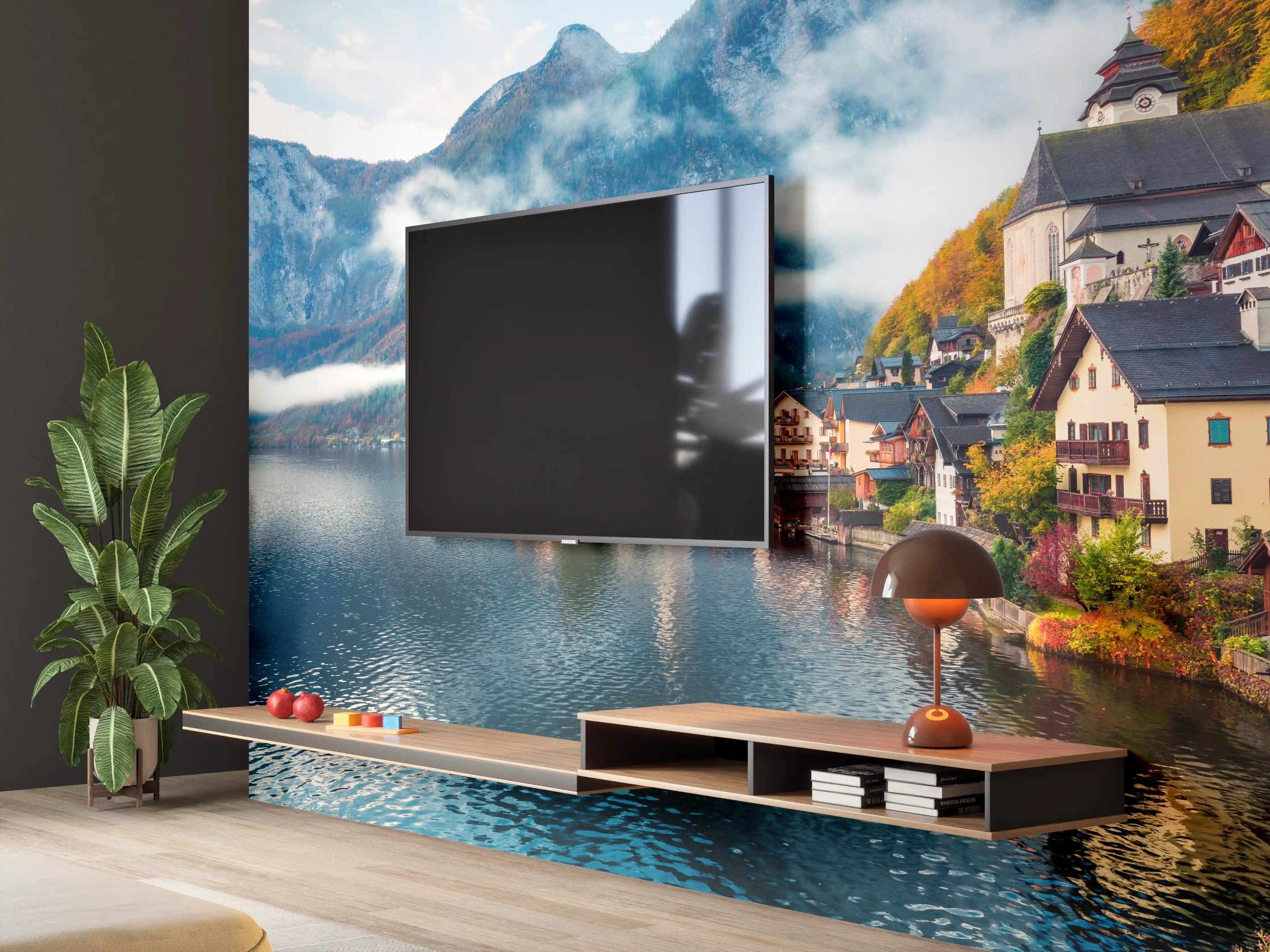 Wandverkleidung Wohnzimmer - Idyllisches Dorf am See mit Bergen im Hintergrund