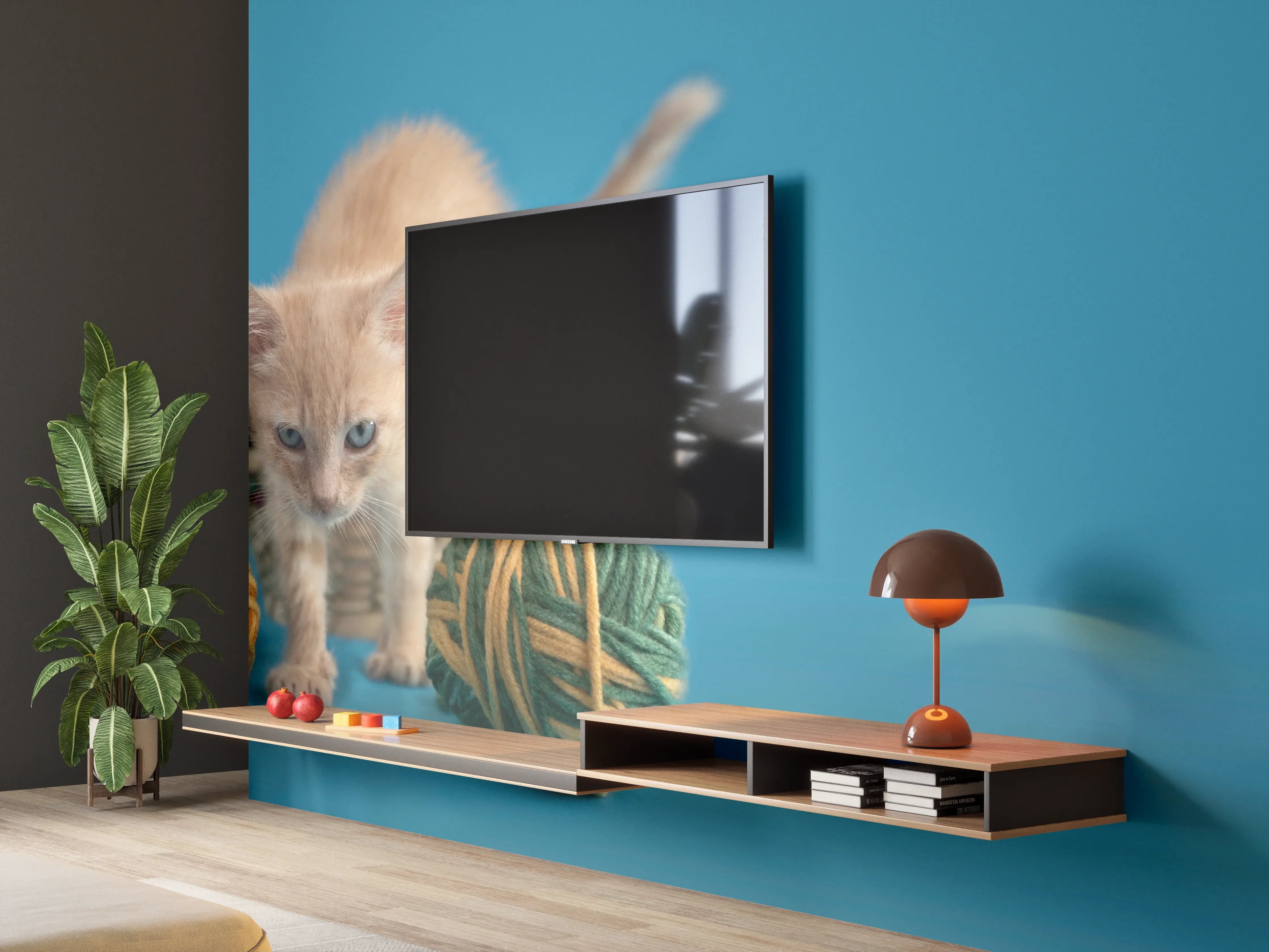 Wandverkleidung Wohnzimmer - Katzenbaby spielt mit Wollknollen