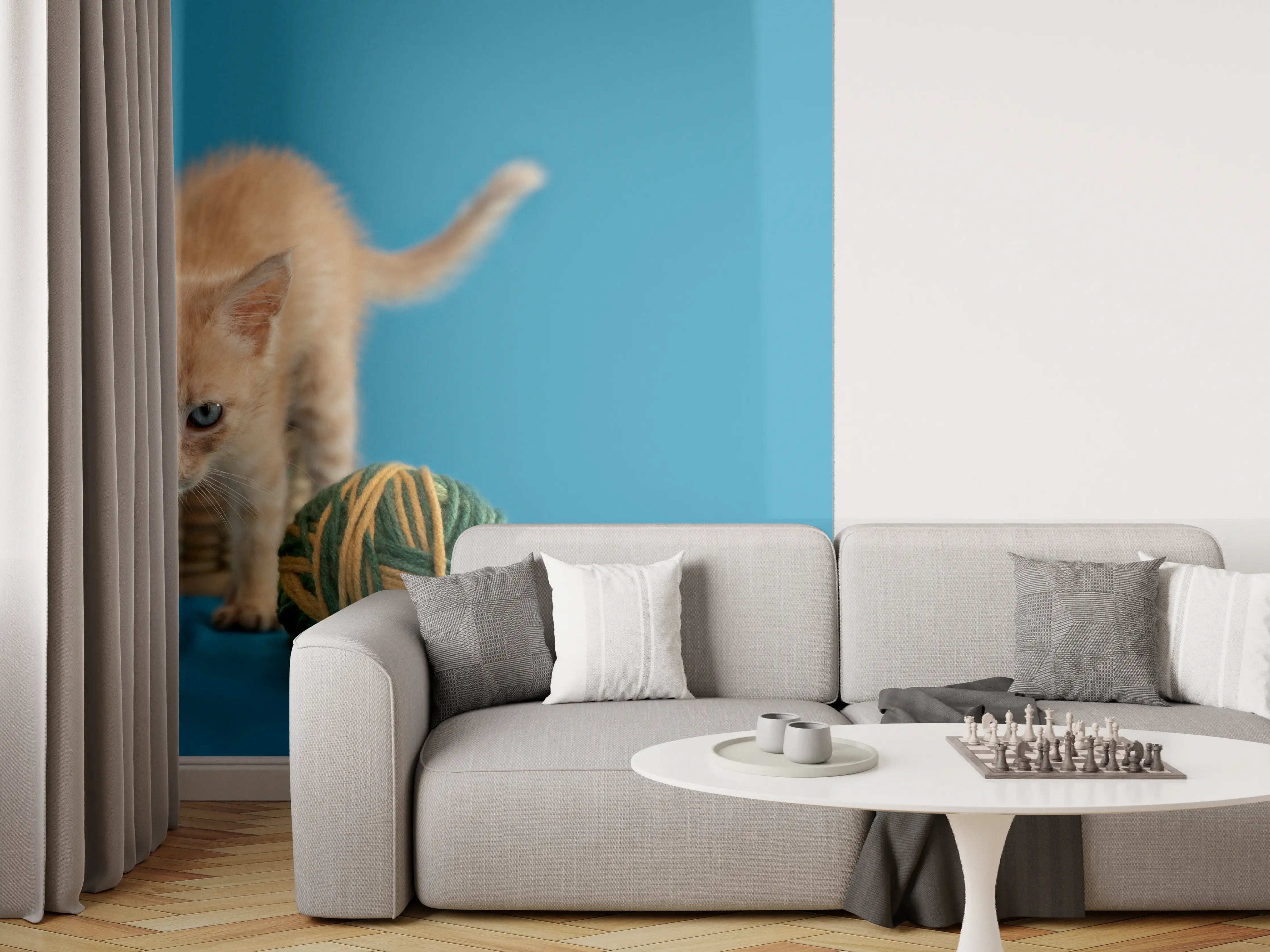 Wandverkleidung Wohnzimmer - Katzenbaby spielt mit Wollknollen