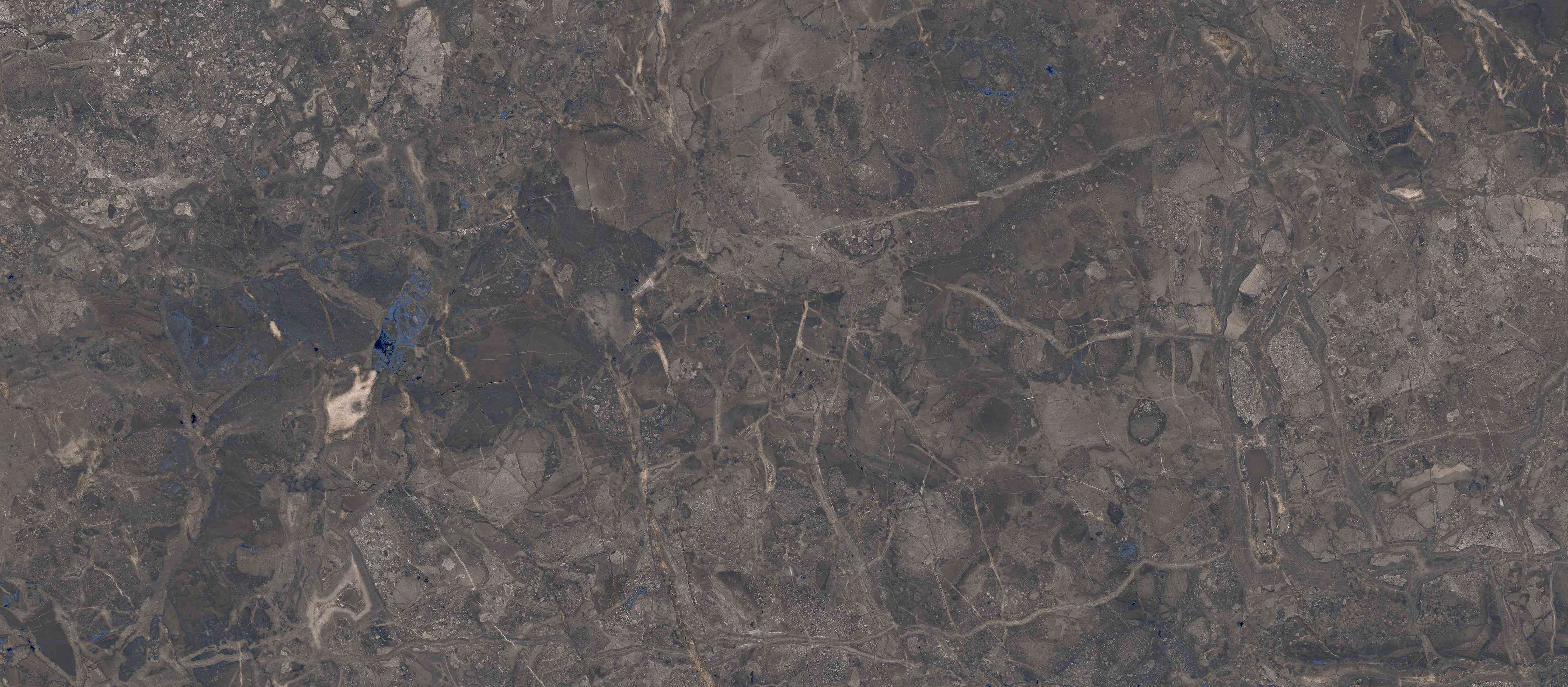 Wandverkleidung Wohnzimmer-Natursteinfliese in dunklem Braun