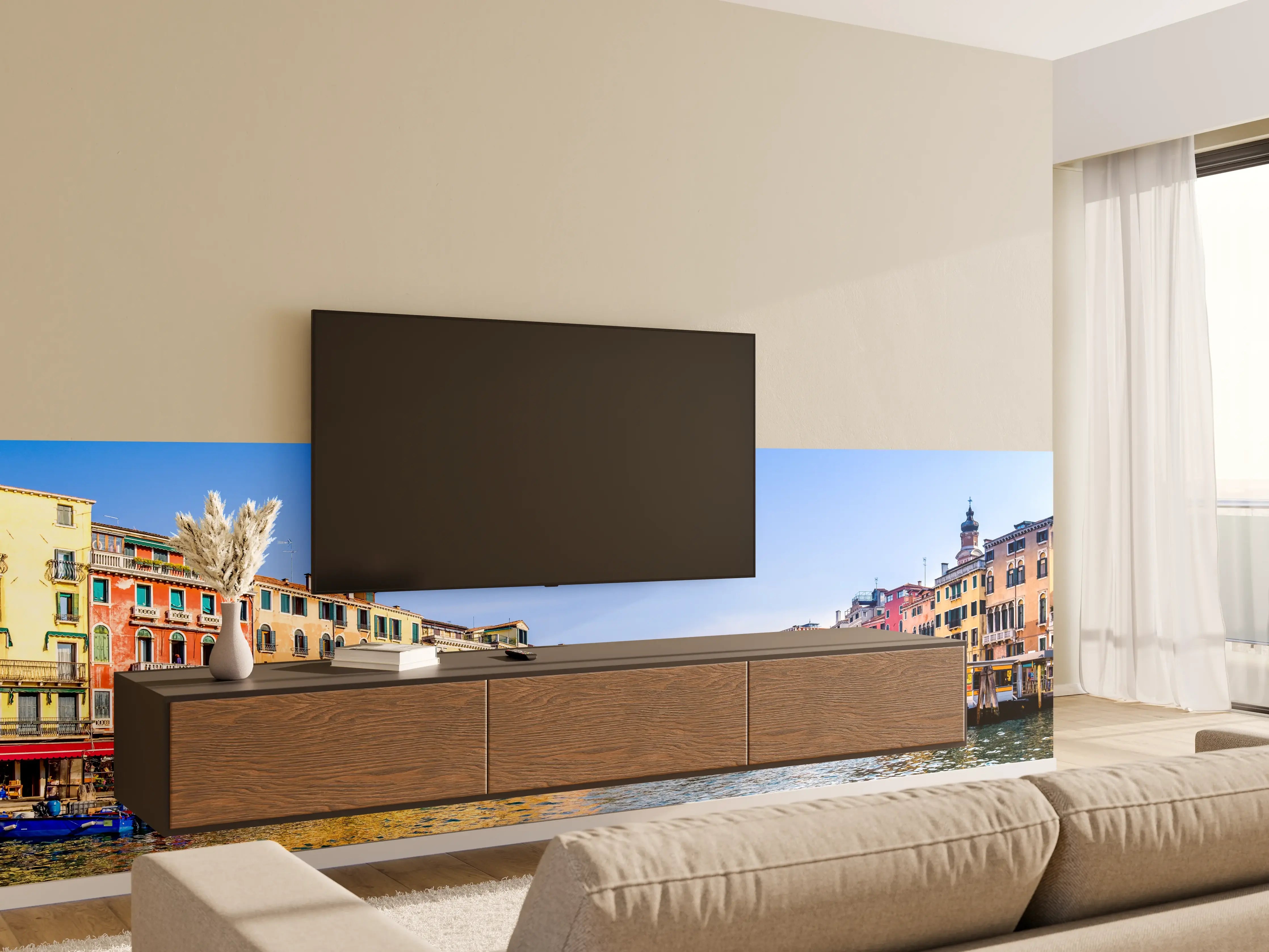 Wandverkleidung Wohnzimmer - Panoramablick auf eine bunte Stadt am Wasser bei Sonnenschein