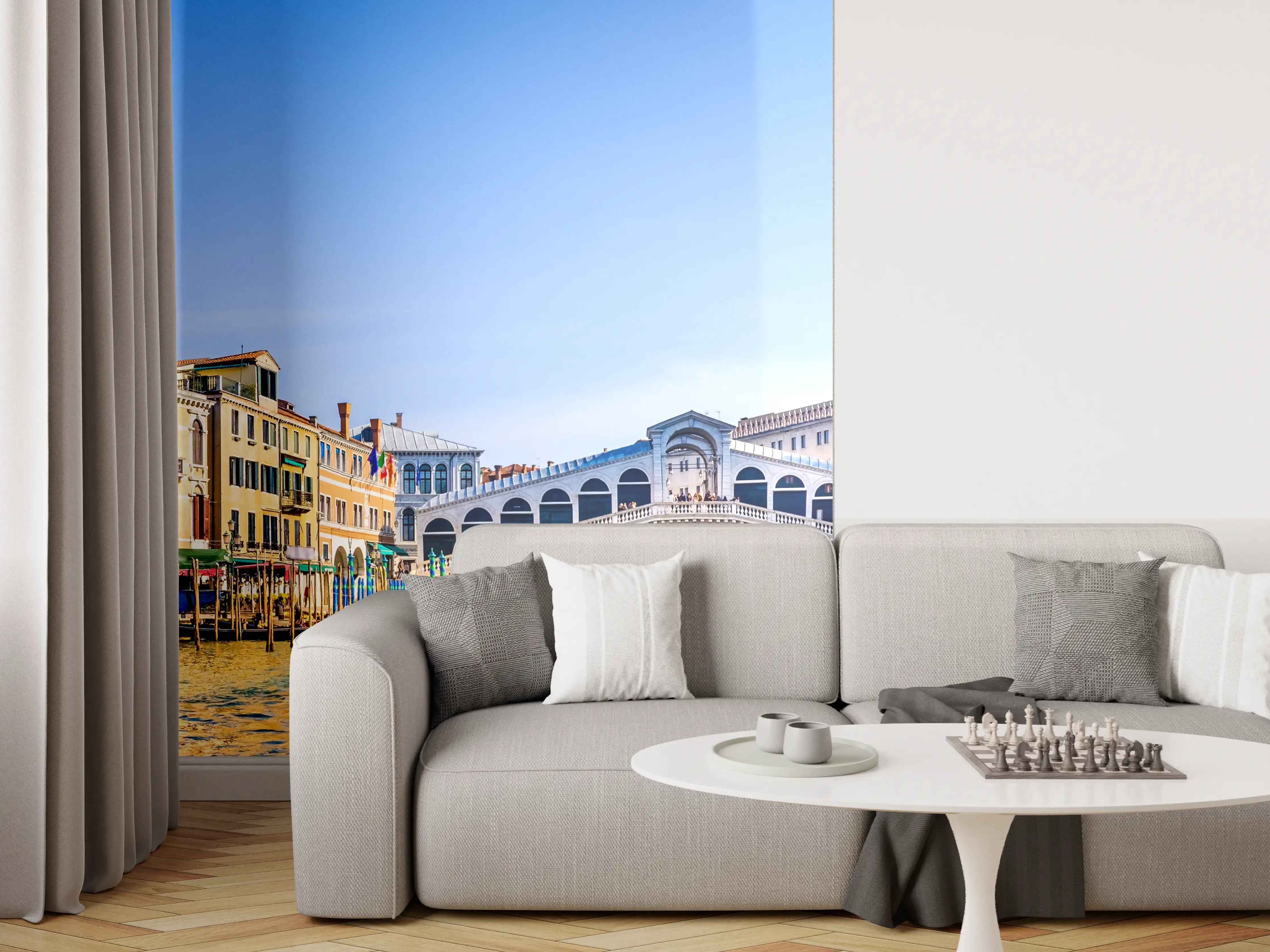 Wandverkleidung Wohnzimmer - Panoramablick auf eine bunte Stadt am Wasser bei Sonnenschein