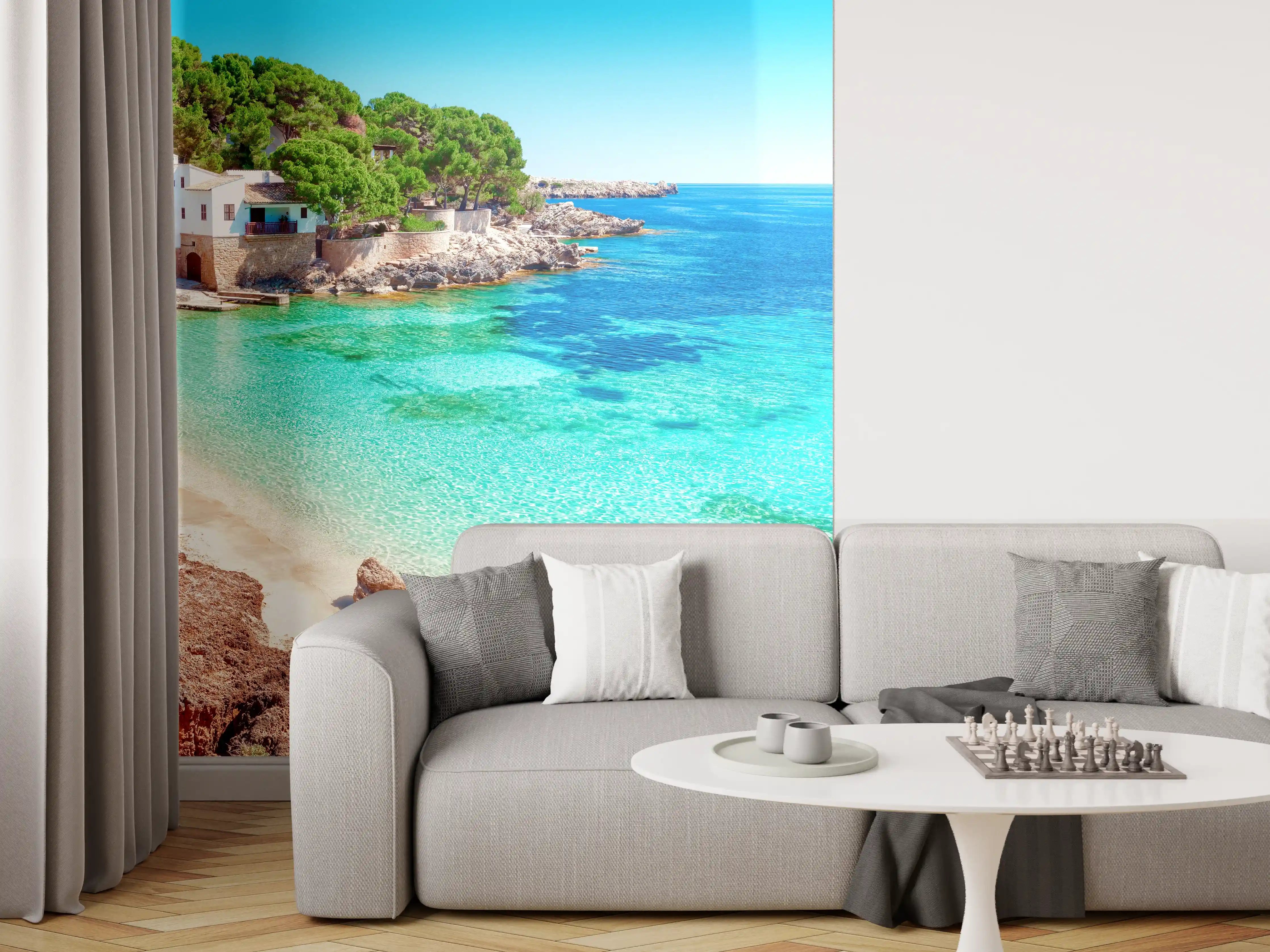Wandverkleidung Wohnzimmer - Paradiesischer Strand mit klarem Wasser und Haus am Ufer