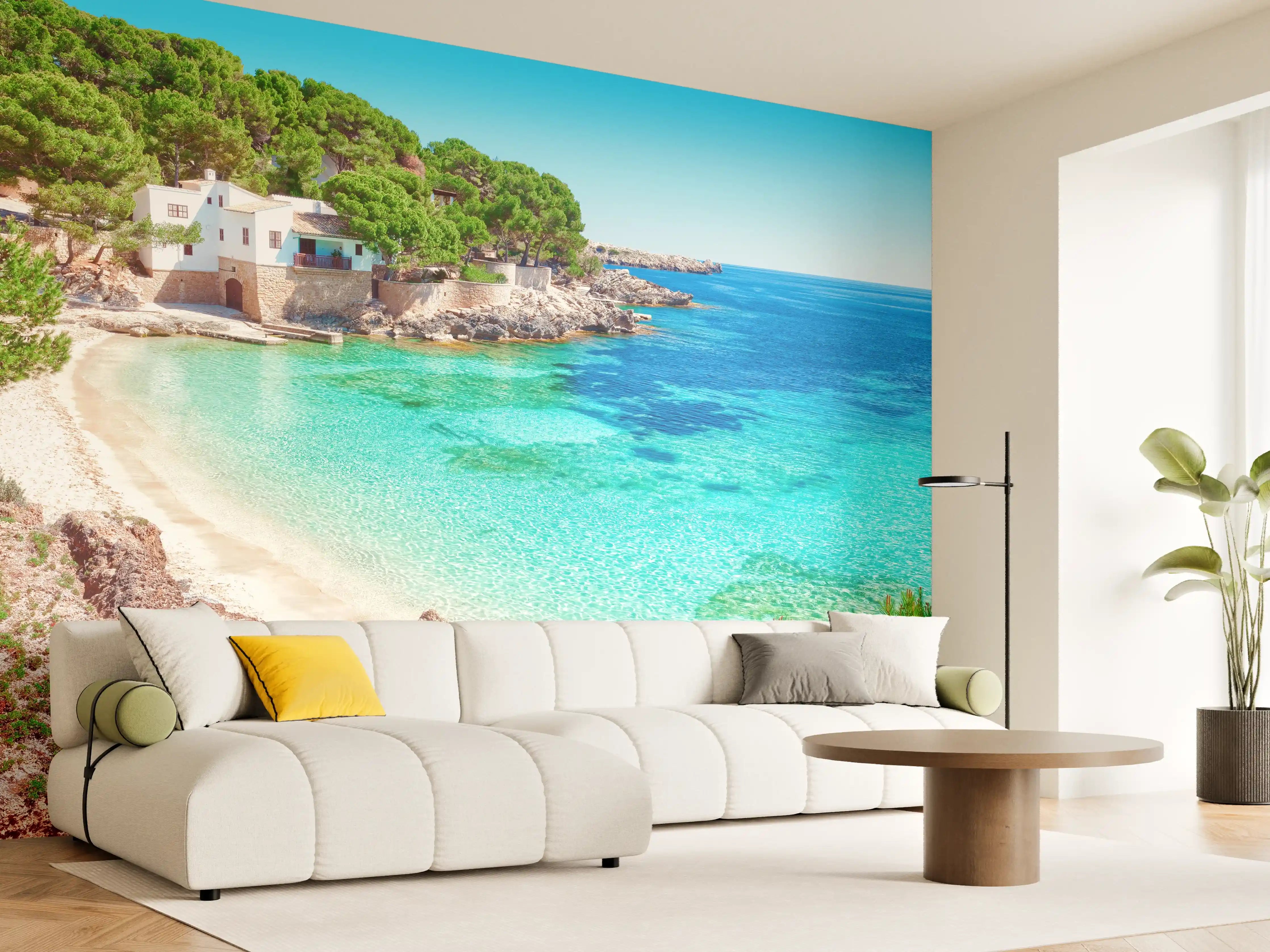 Wandverkleidung Wohnzimmer - Paradiesischer Strand mit klarem Wasser und Haus am Ufer