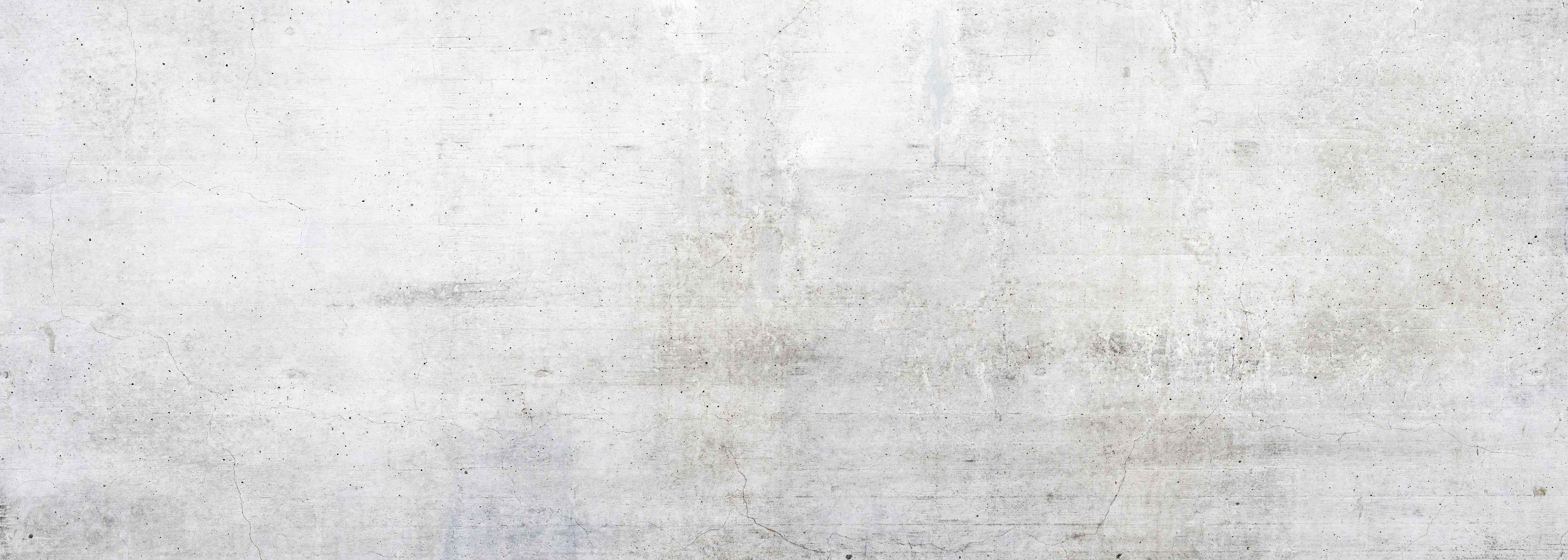 Wandverkleidung Wohnzimmer-Rauer weißer Beton