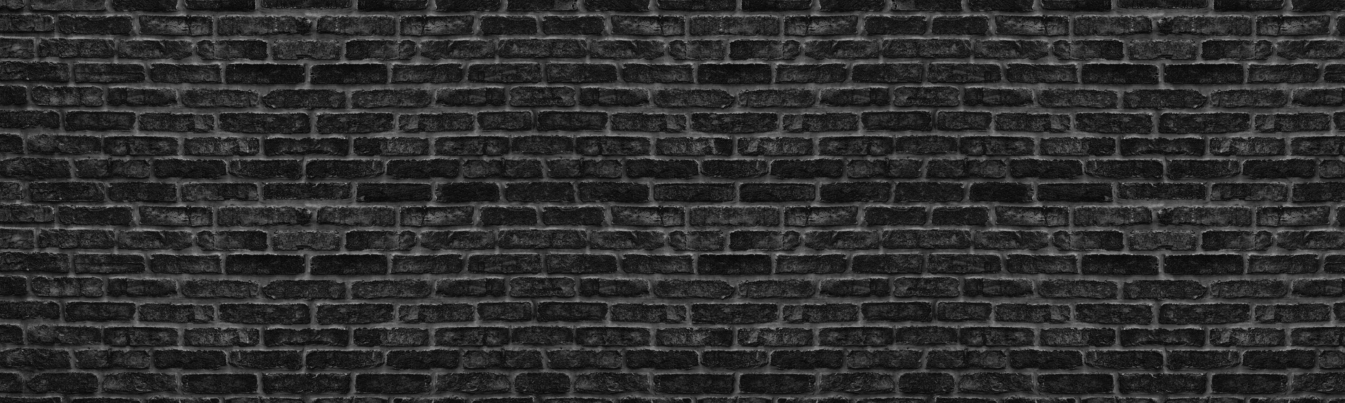 Wandverkleidung Wohnzimmer-Schwarze schlichte Ziegelwand