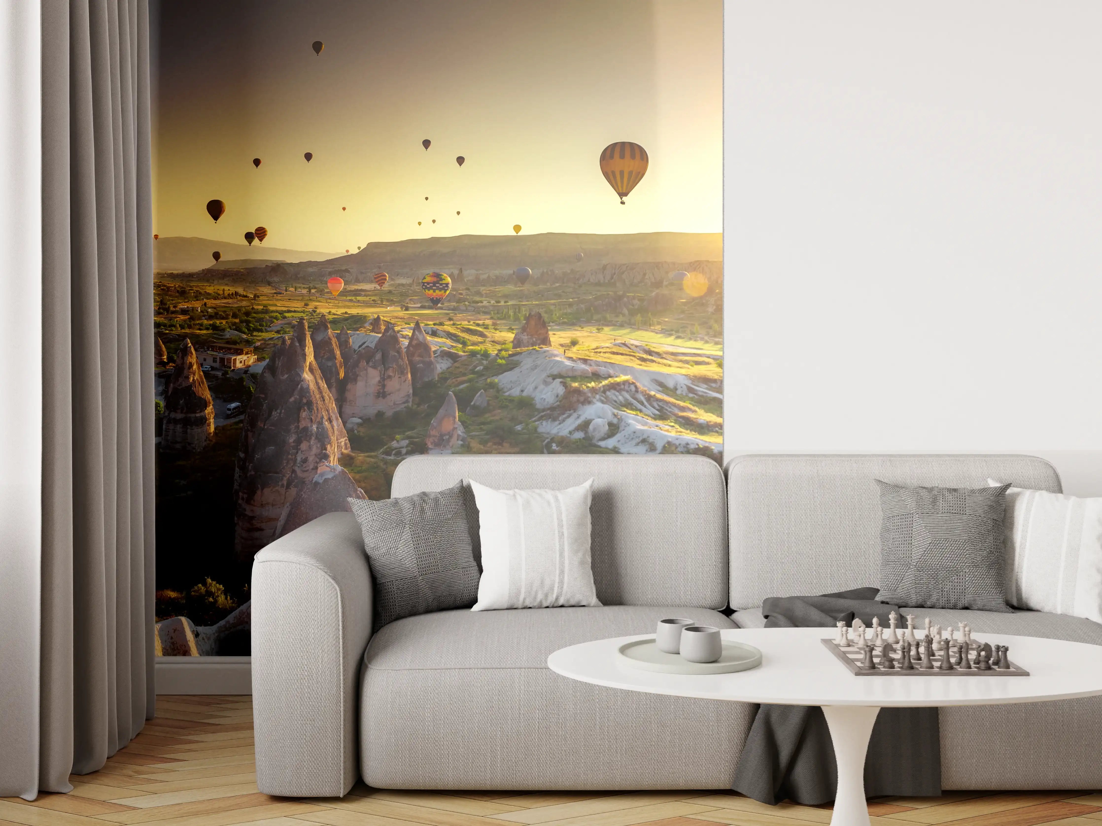 Wandverkleidung Wohnzimmer - Sonnenaufgang über der Landschaft mit Heißluftballons
