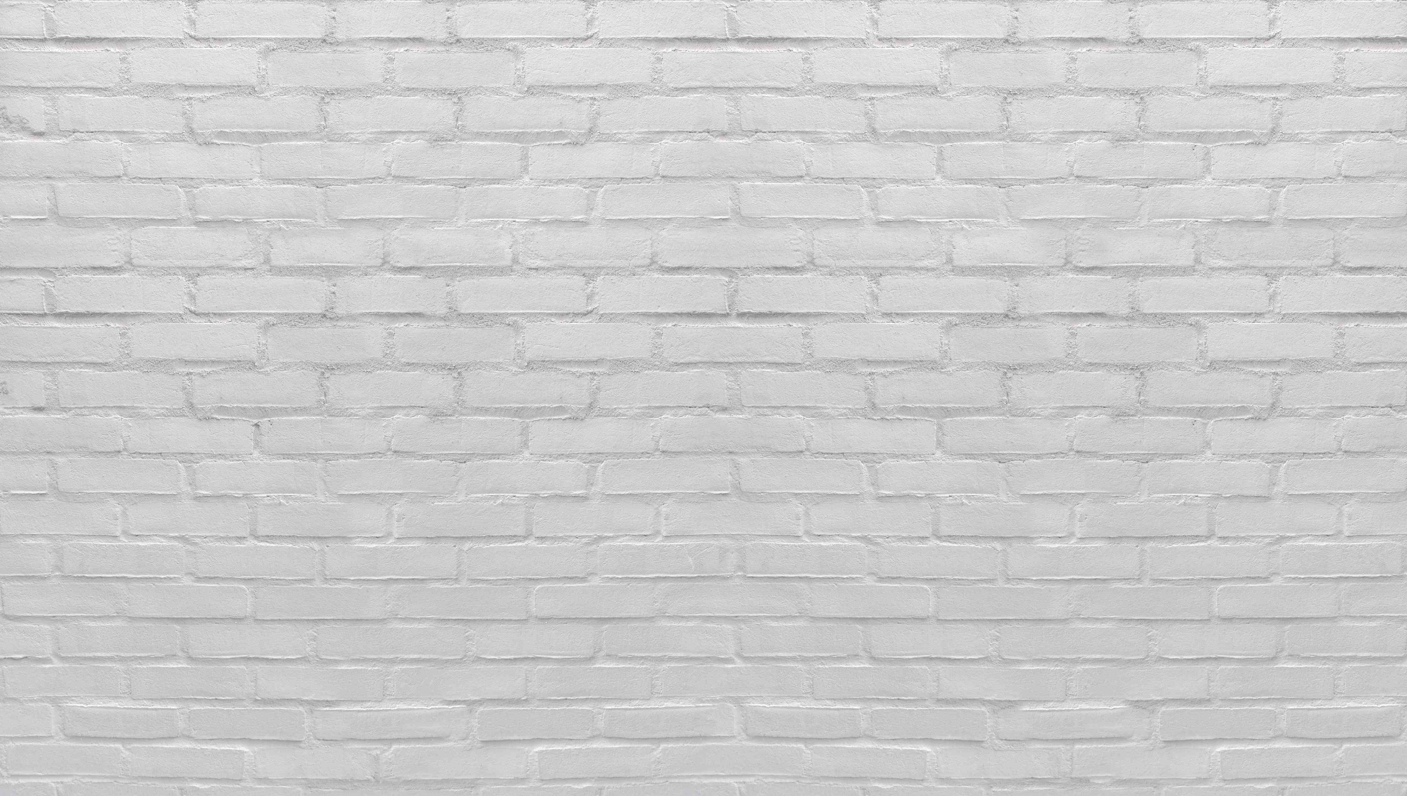 Wandverkleidung Wohnzimmer-Weißliche Ziegelwand