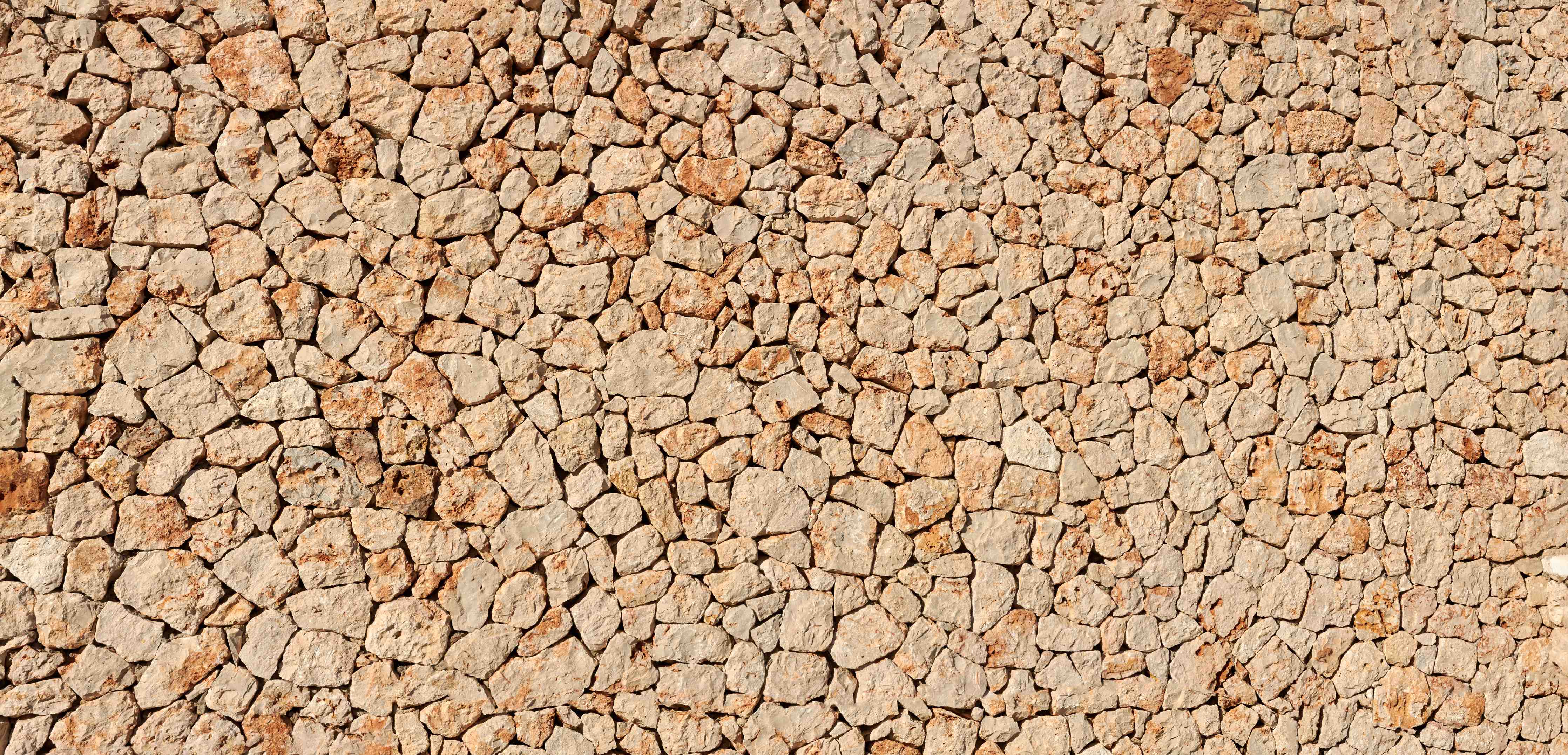 Wandverkleidung außen-Bräunliche Panorama-Textur Steinmauer