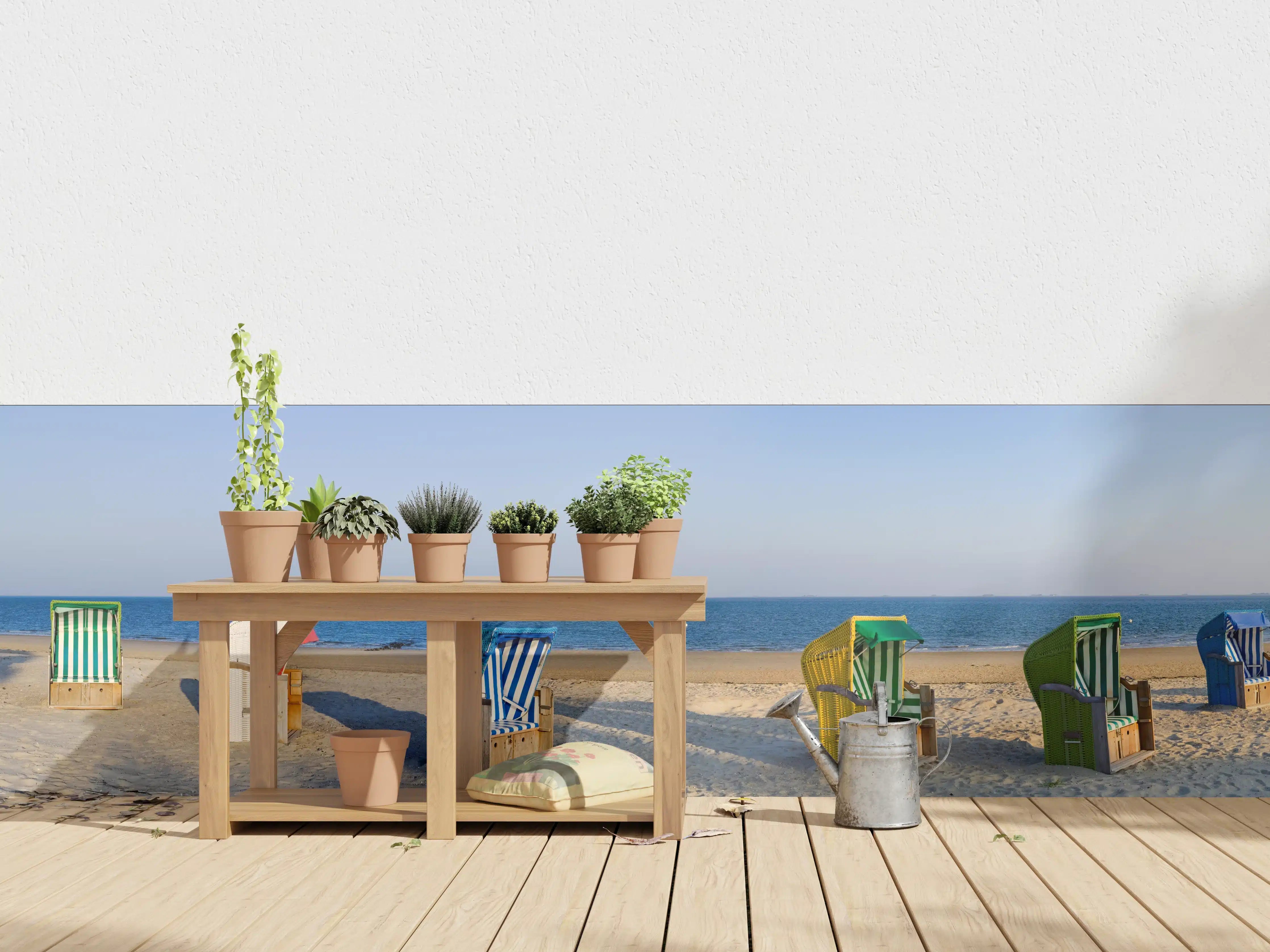 Wandverkleidung außen - Bunte Strandstühle am Meer bei Sonnenuntergang