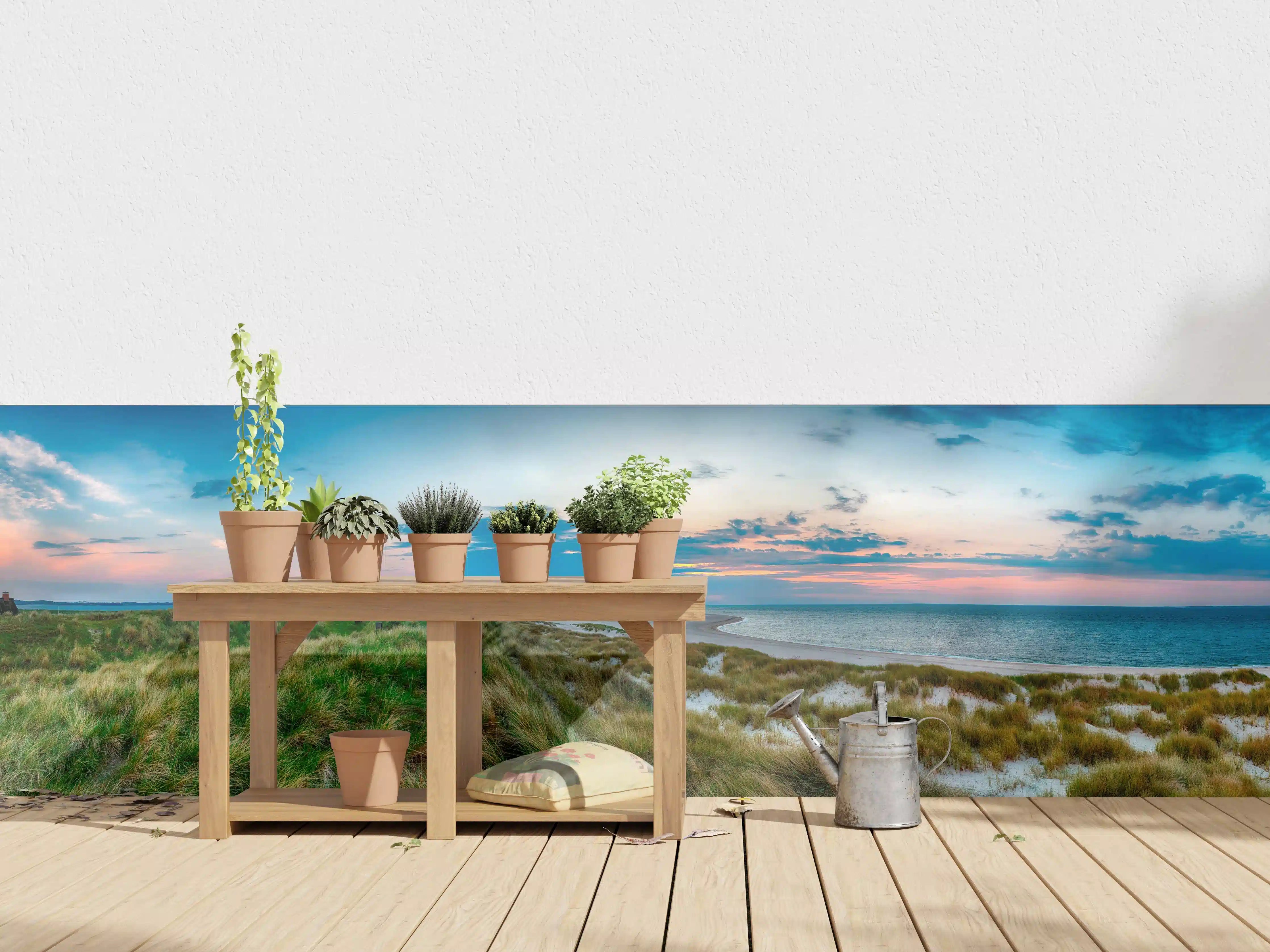Wandverkleidung außen - Leuchtturm am Strand bei Sonnenuntergang