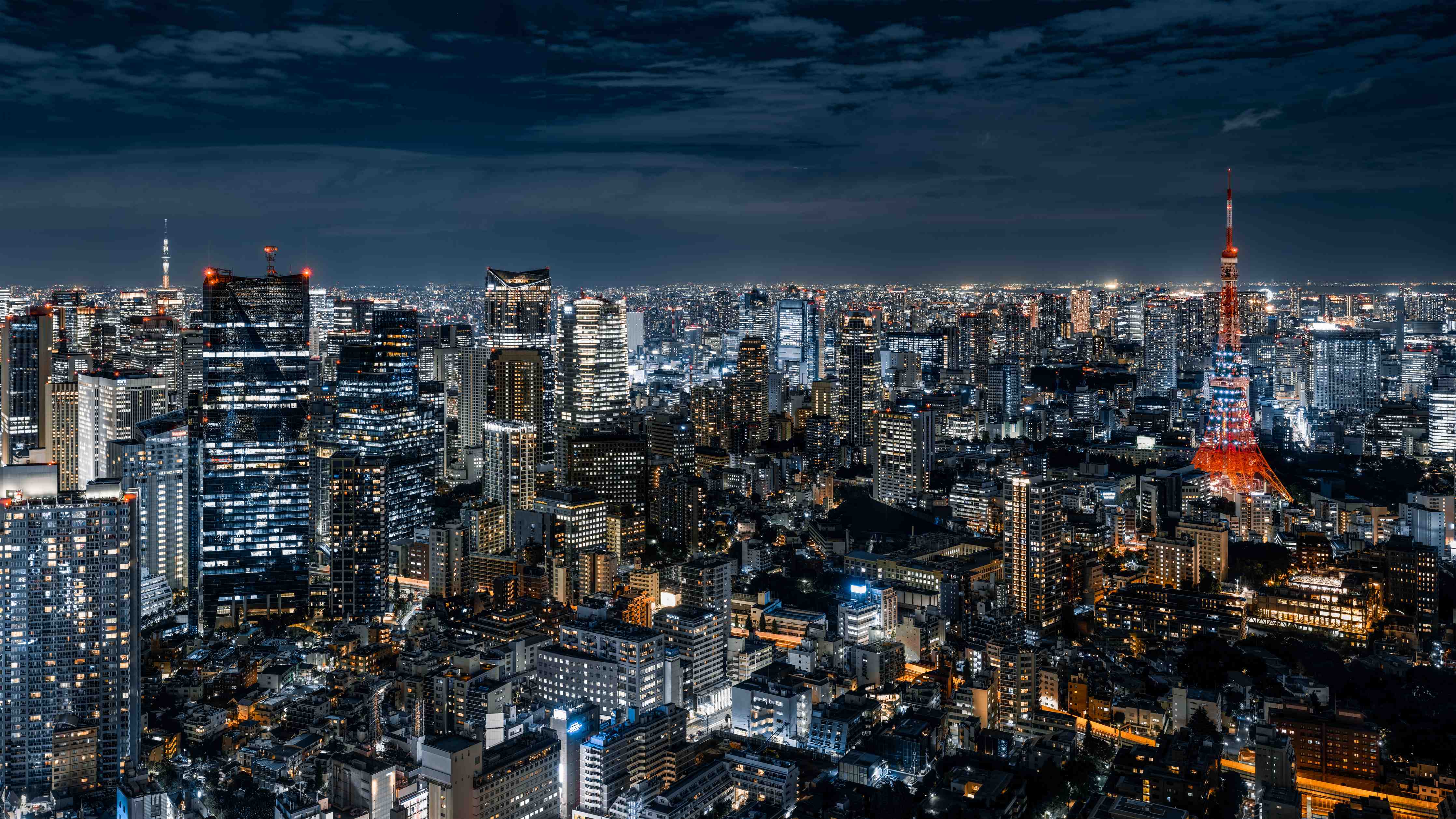 Wandverkleidung außen-Nachtfotografie einer Stadt mit Lichtspielen