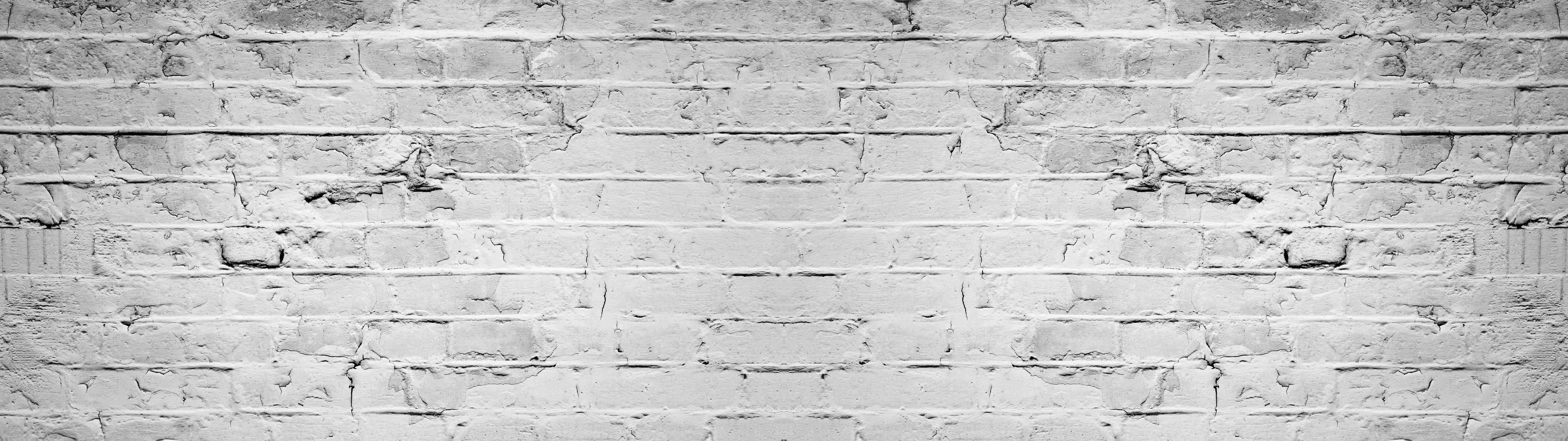 Wandverkleidung außen-Weiß grau beschädigte Backstein Wand