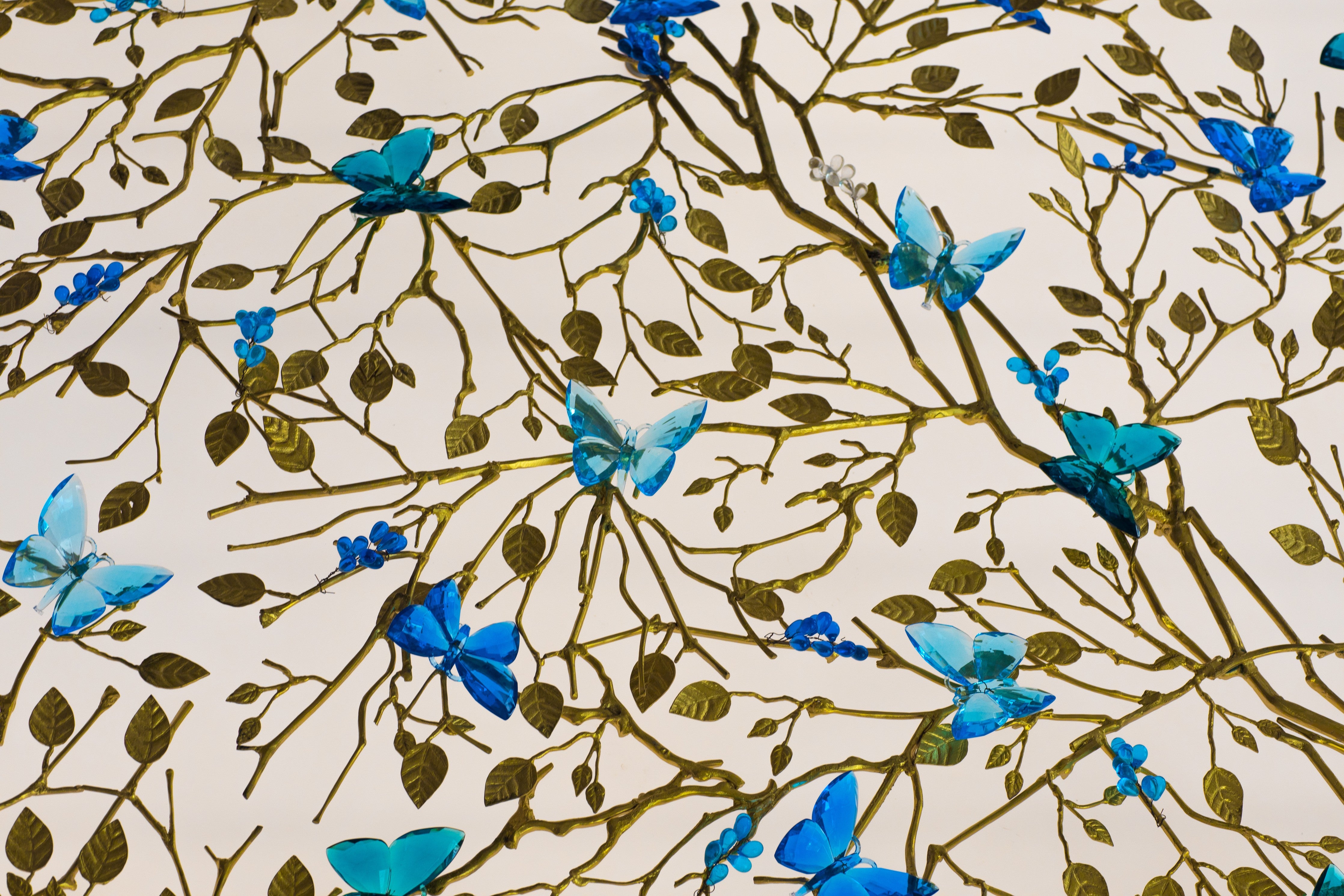 Waschbecken-Rückwand-Blaue Schmetterlinge auf Zweigen Muster