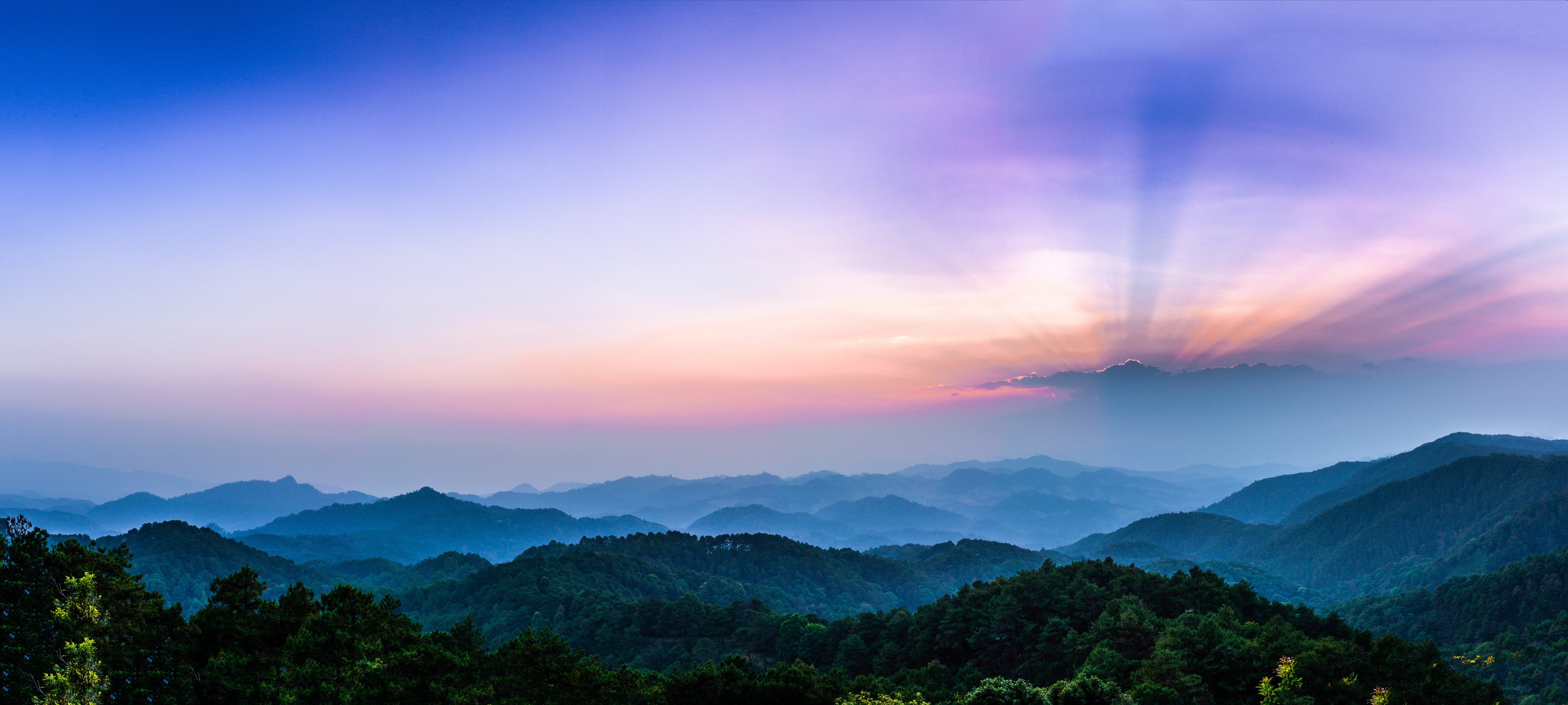 Waschbecken-Rückwand-Bunte Sonnenuntergangsstimmung über den Bergen