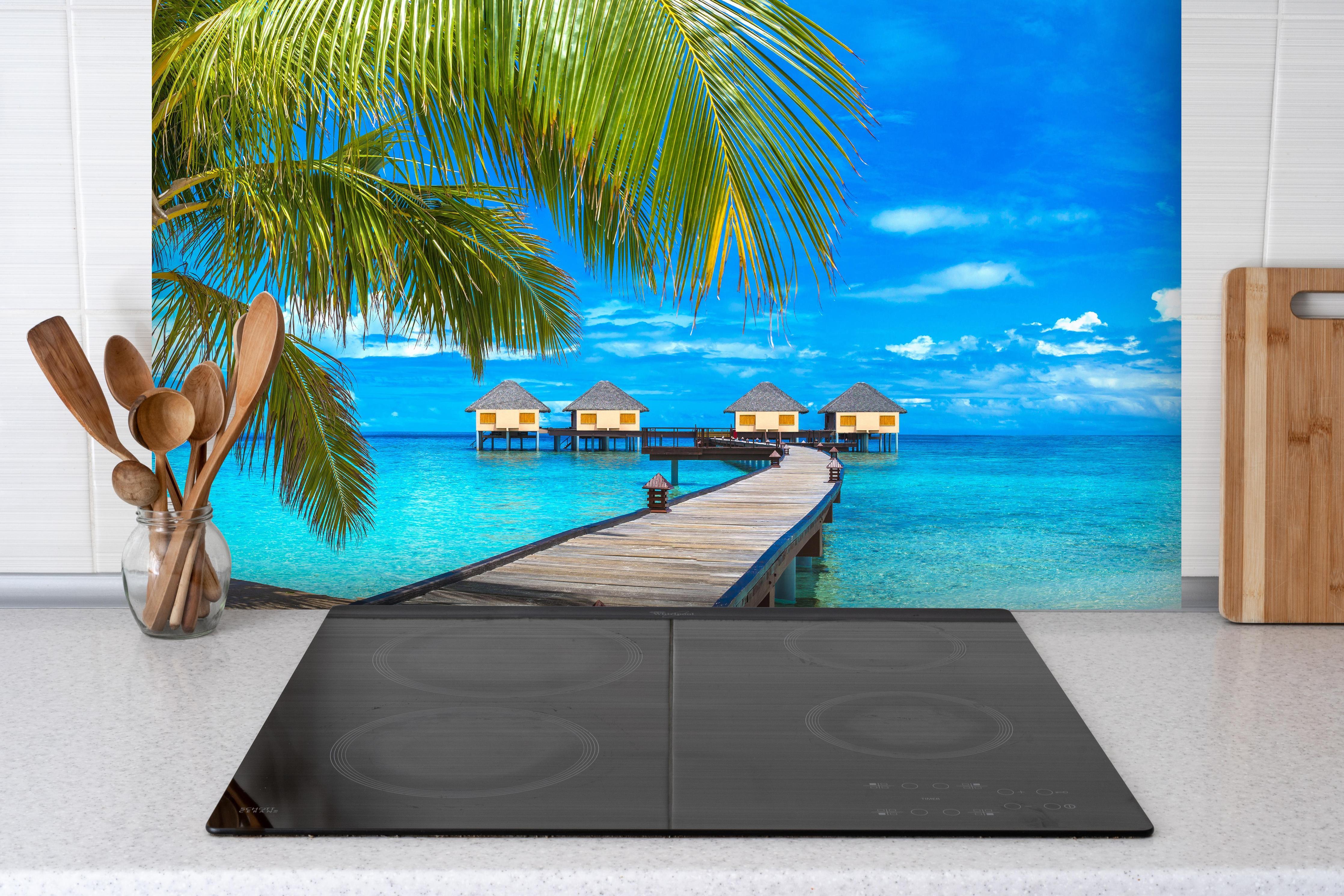 Spritzschutz - Bungalows auf den Malediven bei Tag