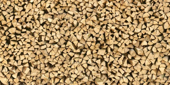 Küchenrückwand - Großer Haufen Holzscheite