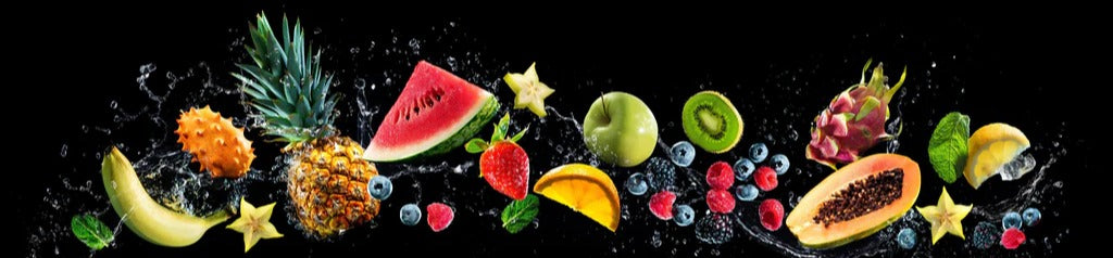 Küchenrückwand - Bunte Früchte mit Wasserspritzern