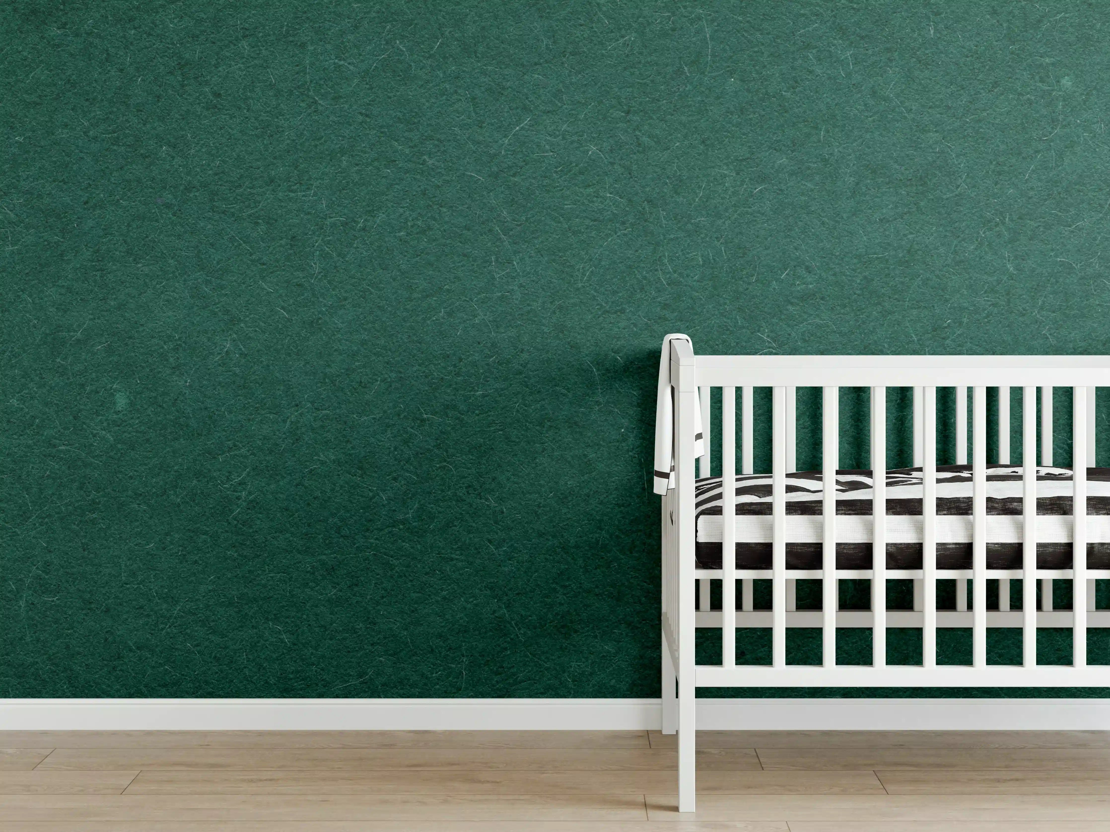Babyzimmer Wandgestaltung - Dunkelgrüner Pflanzenhintergrund mit feiner Textur