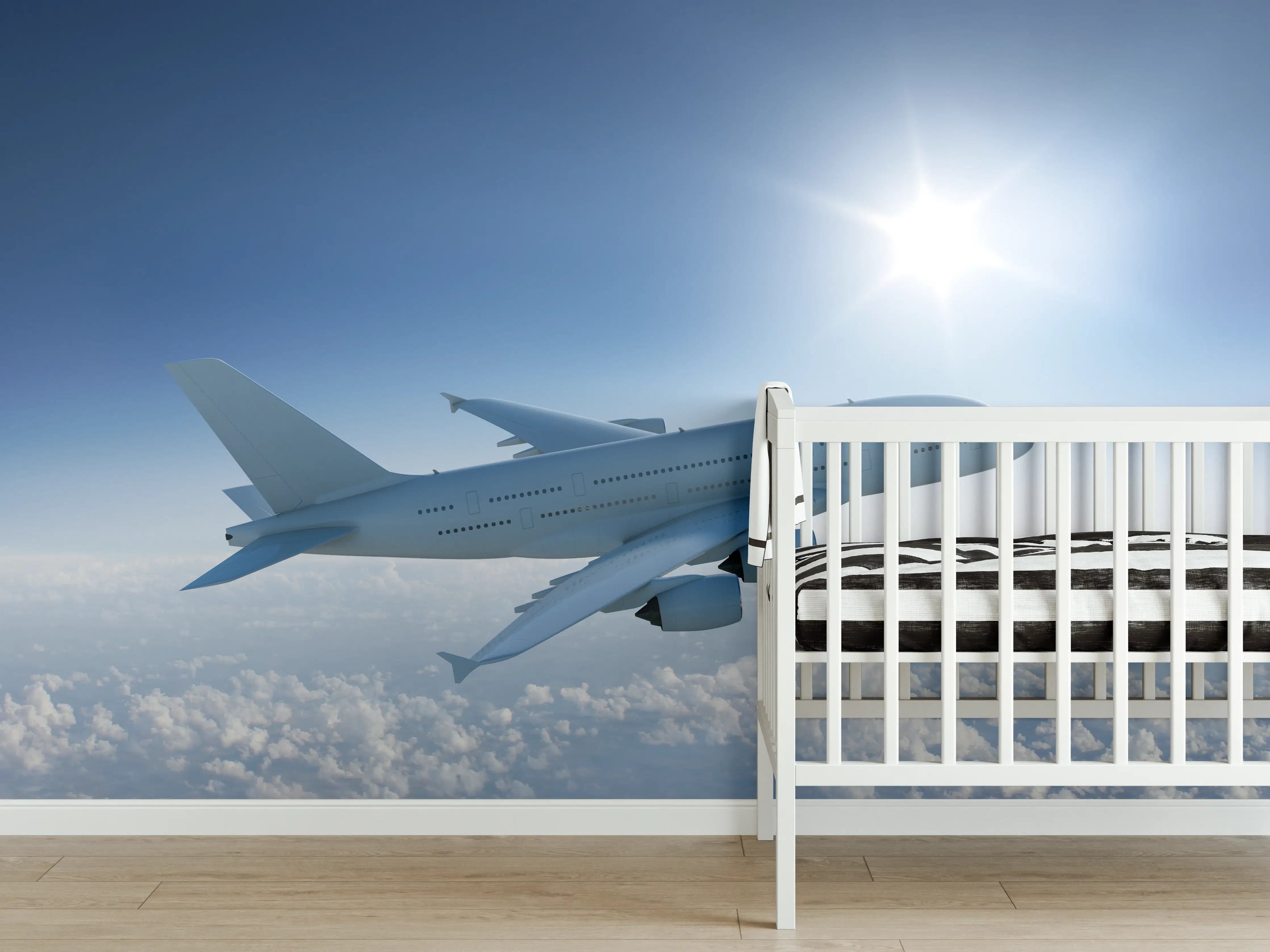Babyzimmer Wandgestaltung - Flugzeug über weißen Wolken