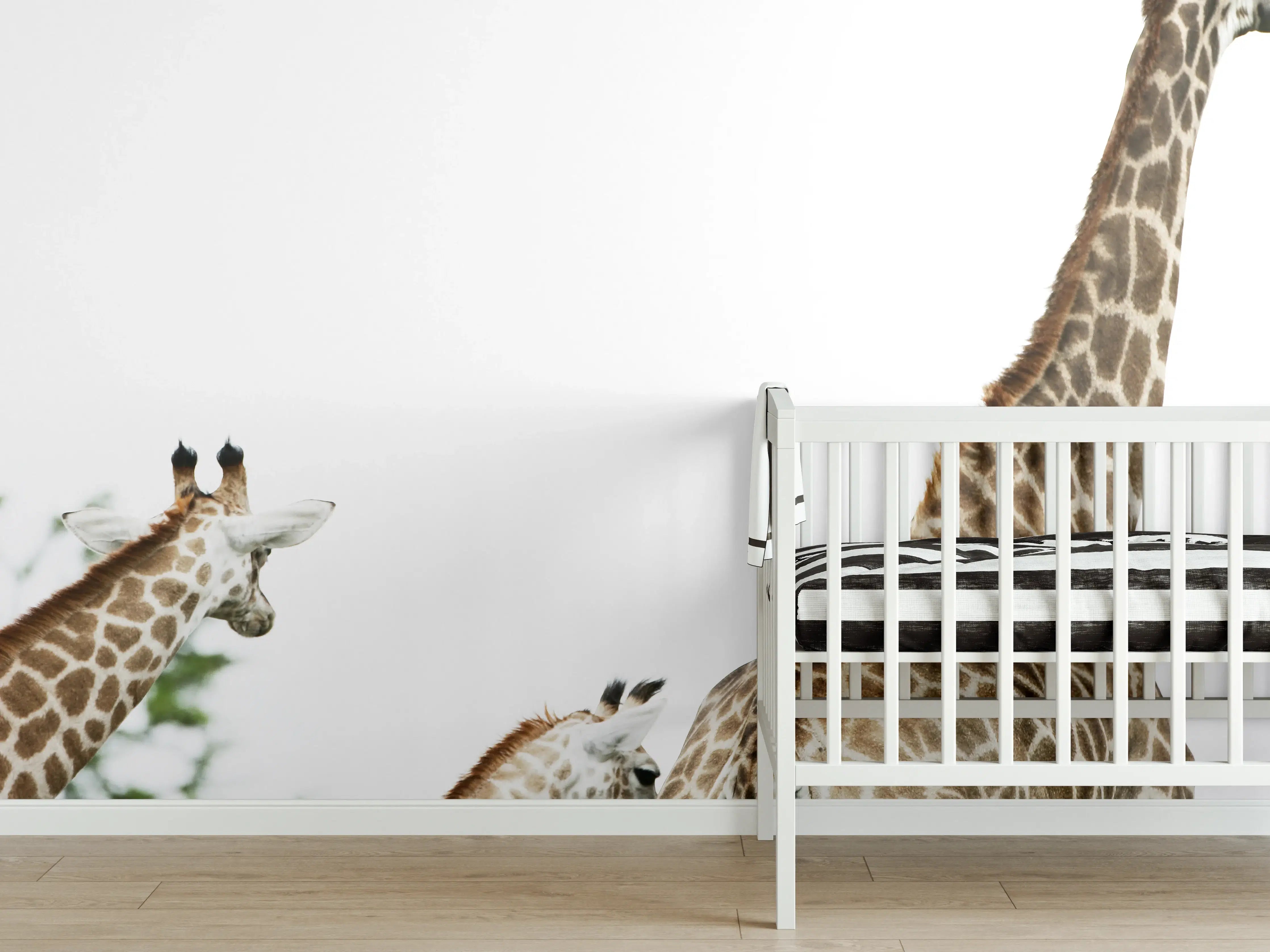 Babyzimmer Wandgestaltung - Giraffen Familie - hell