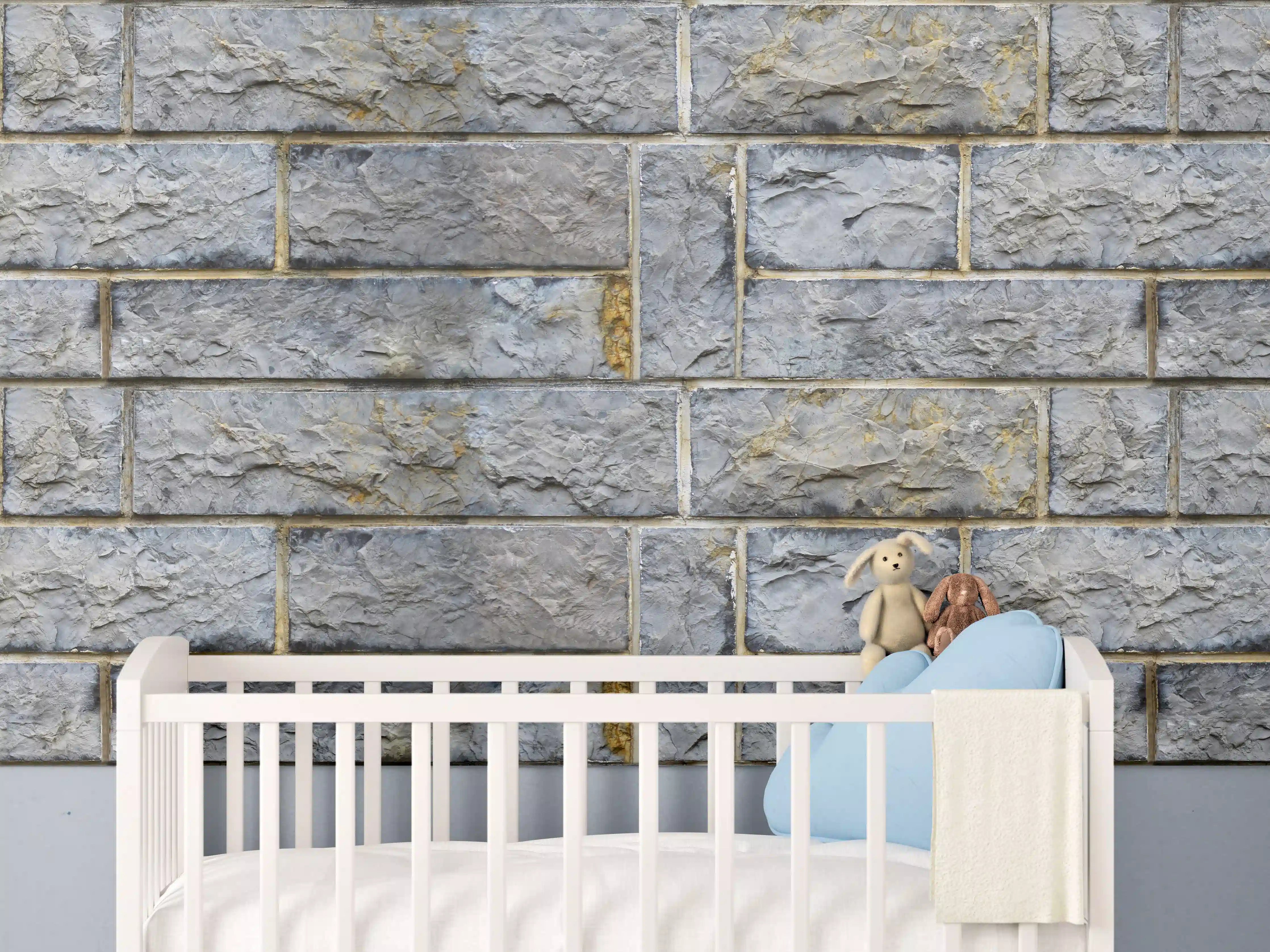Babyzimmer Wandgestaltung - Graue Schnittsteinmauer