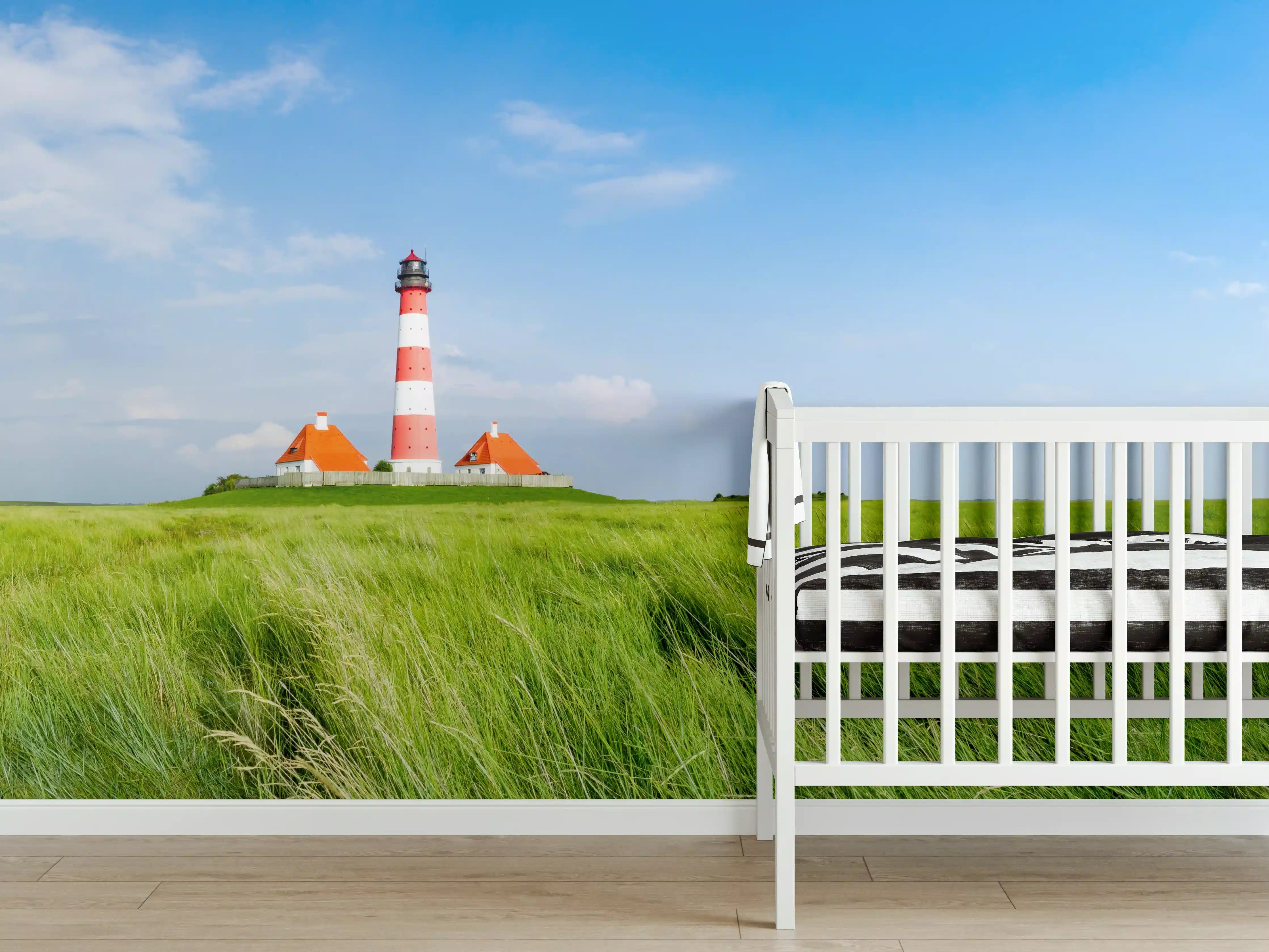 Babyzimmer Wandgestaltung - Leuchtturm in der grünen Landschaft