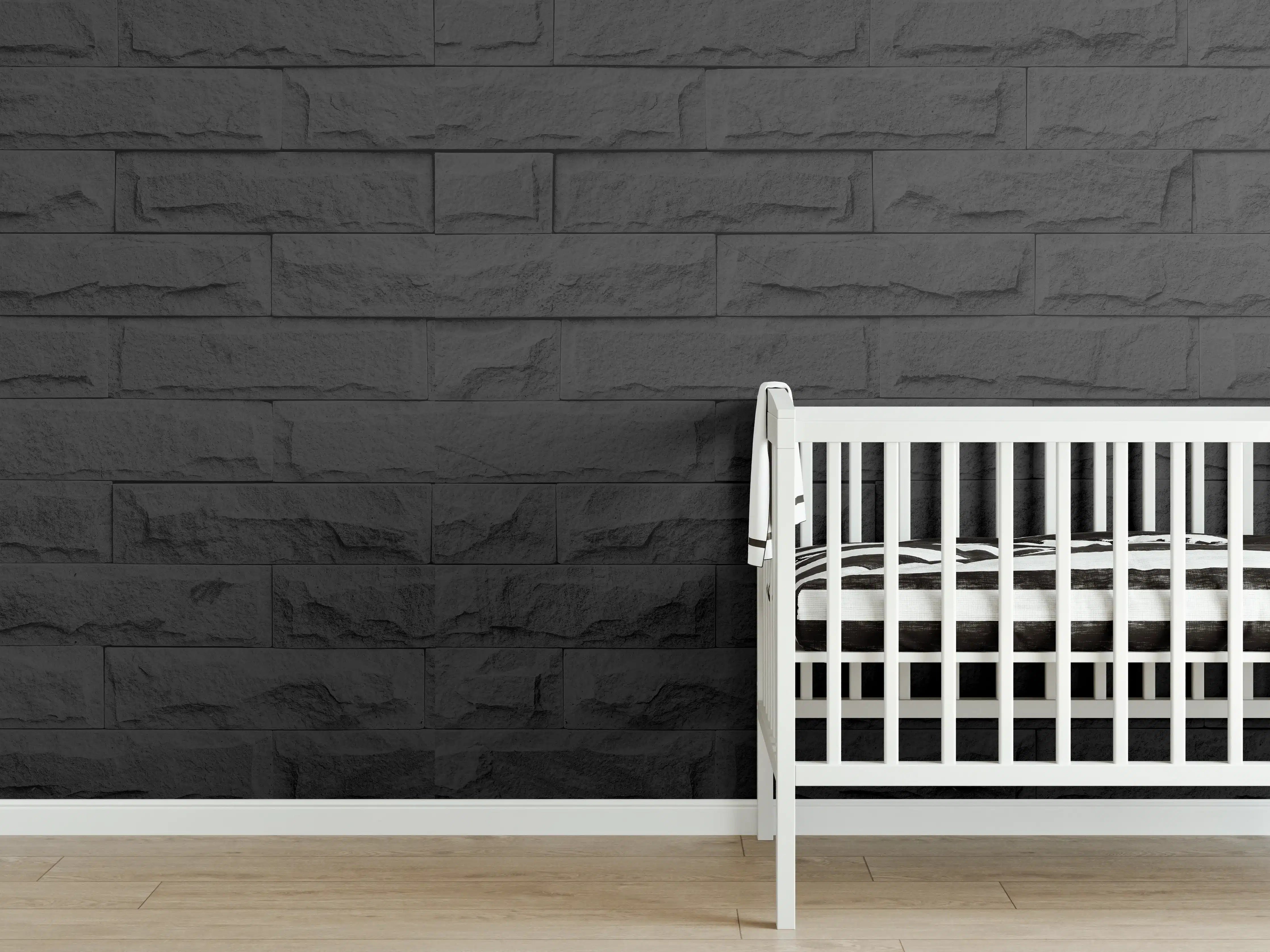Babyzimmer Wandgestaltung - Panorama der modernen schwarzen Backsteinmauer