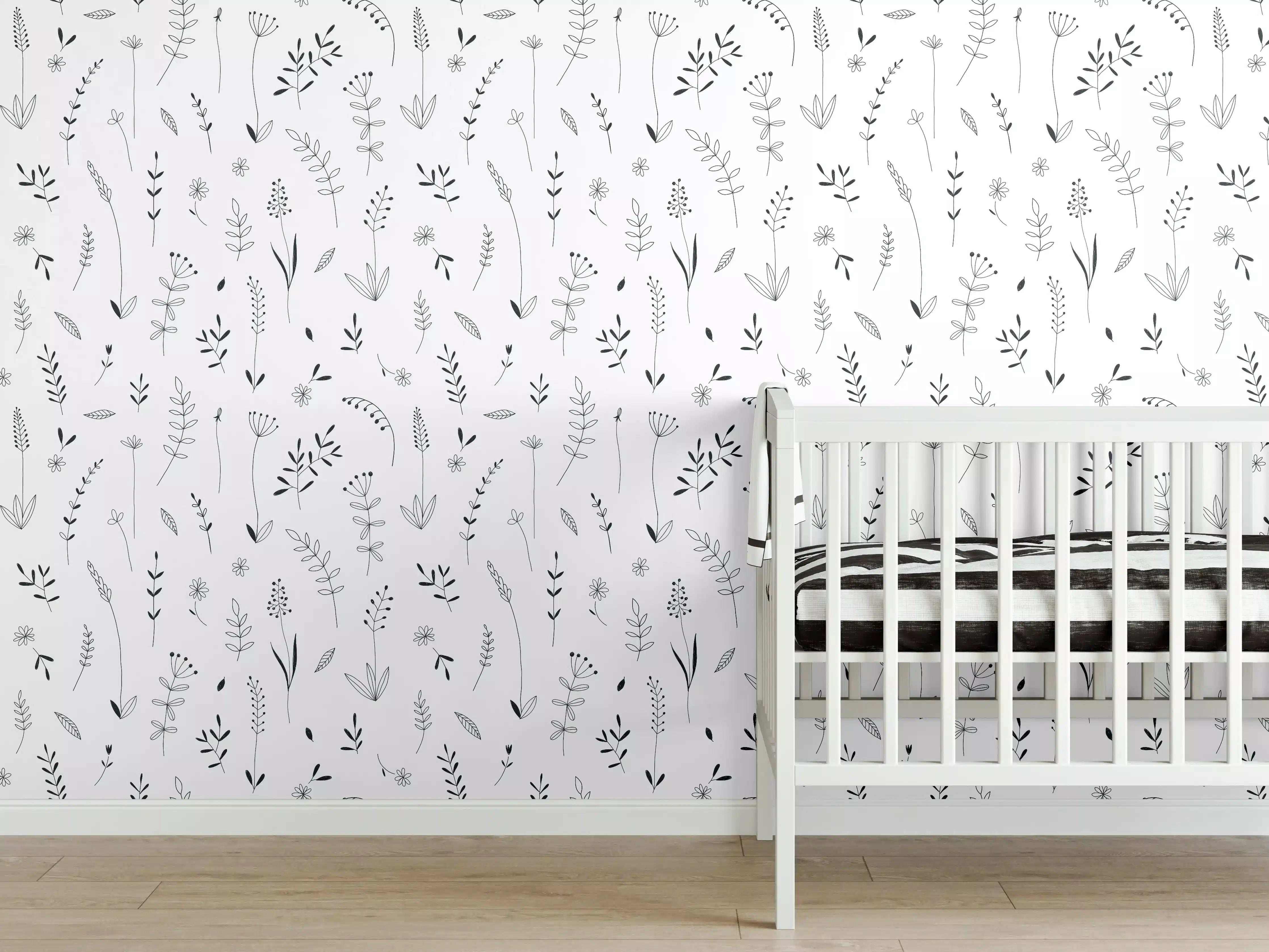 Babyzimmer Wandgestaltung - Schlichte weiße Wand mit zarten grauen Pflanzenmustern