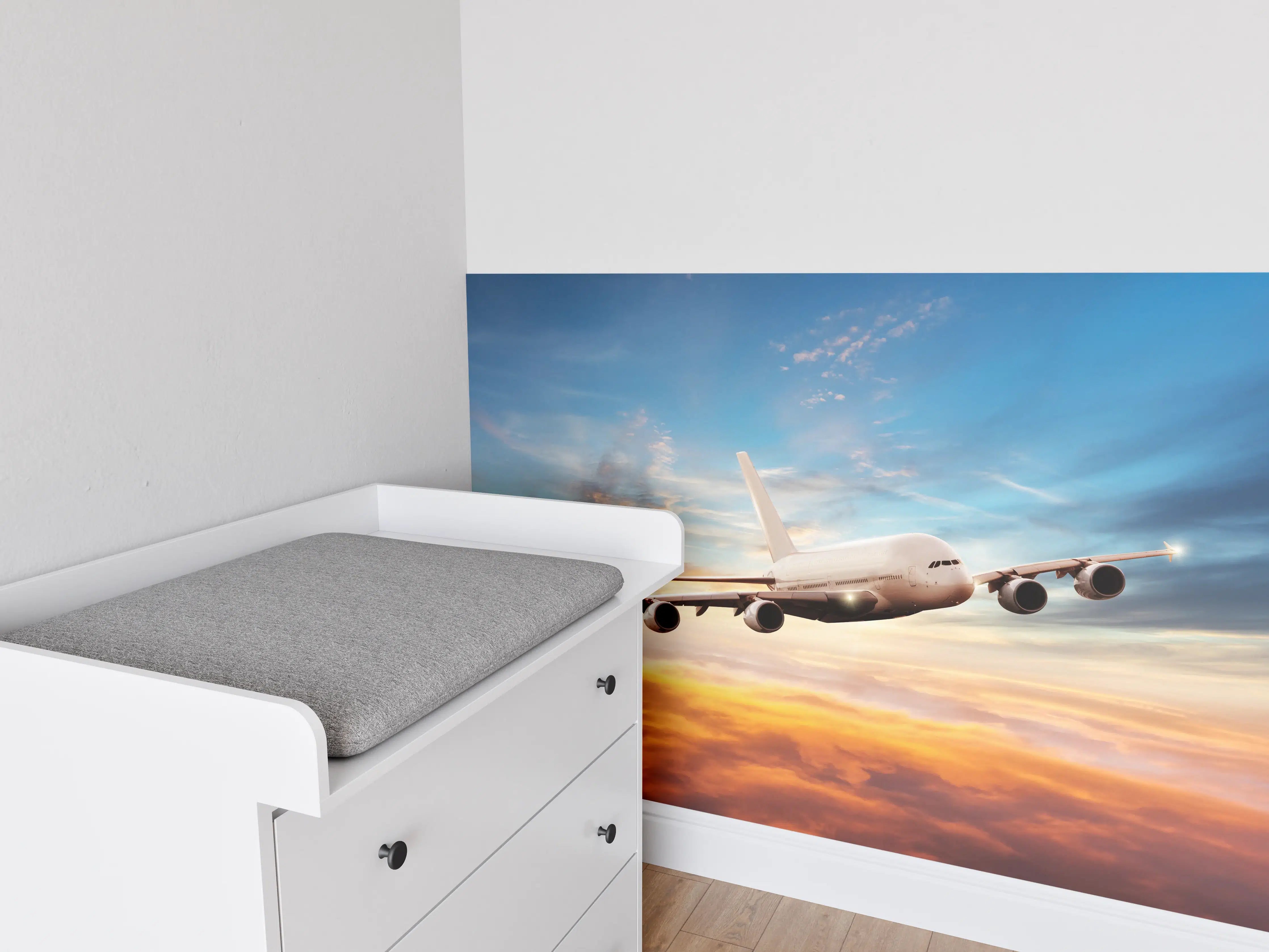 Babyzimmer Wandgestaltung - Sonnenuntergang mit Passagierjet
