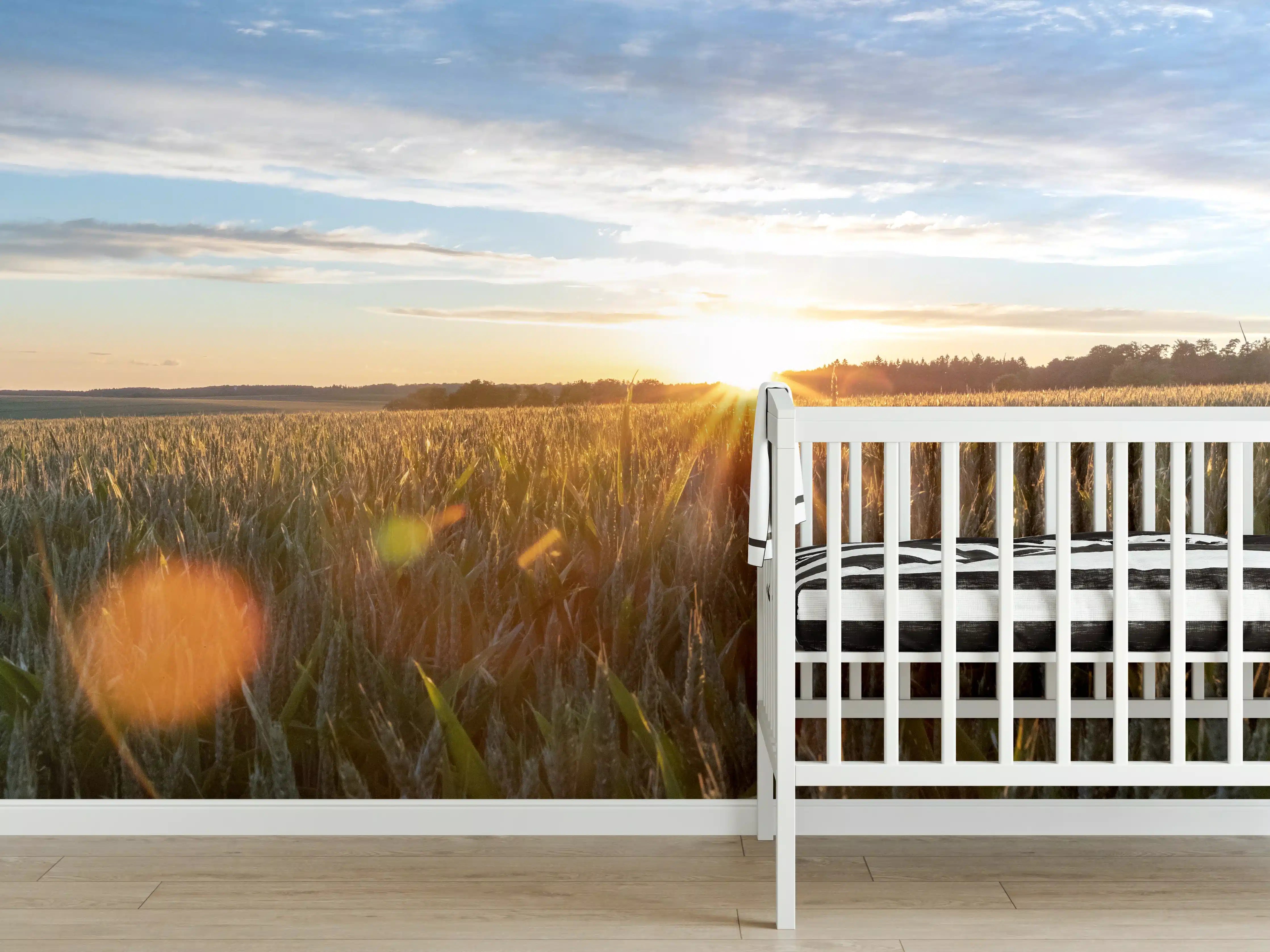 Babyzimmer Wandgestaltung - Sonnenuntergang über einem Kornfeld