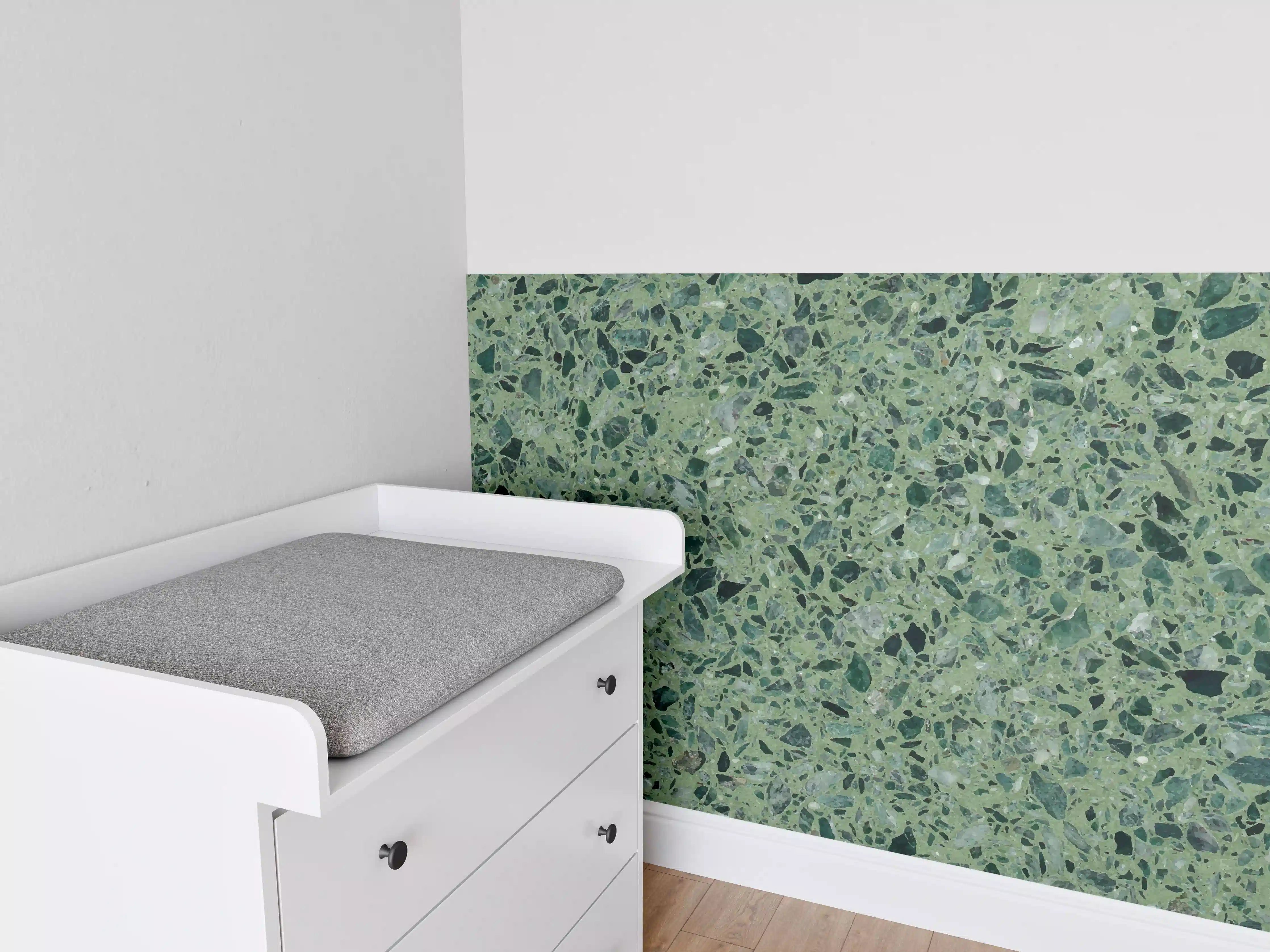 Babyzimmer Wandgestaltung - Terrazzo Textur auf türkisem Hintergrund