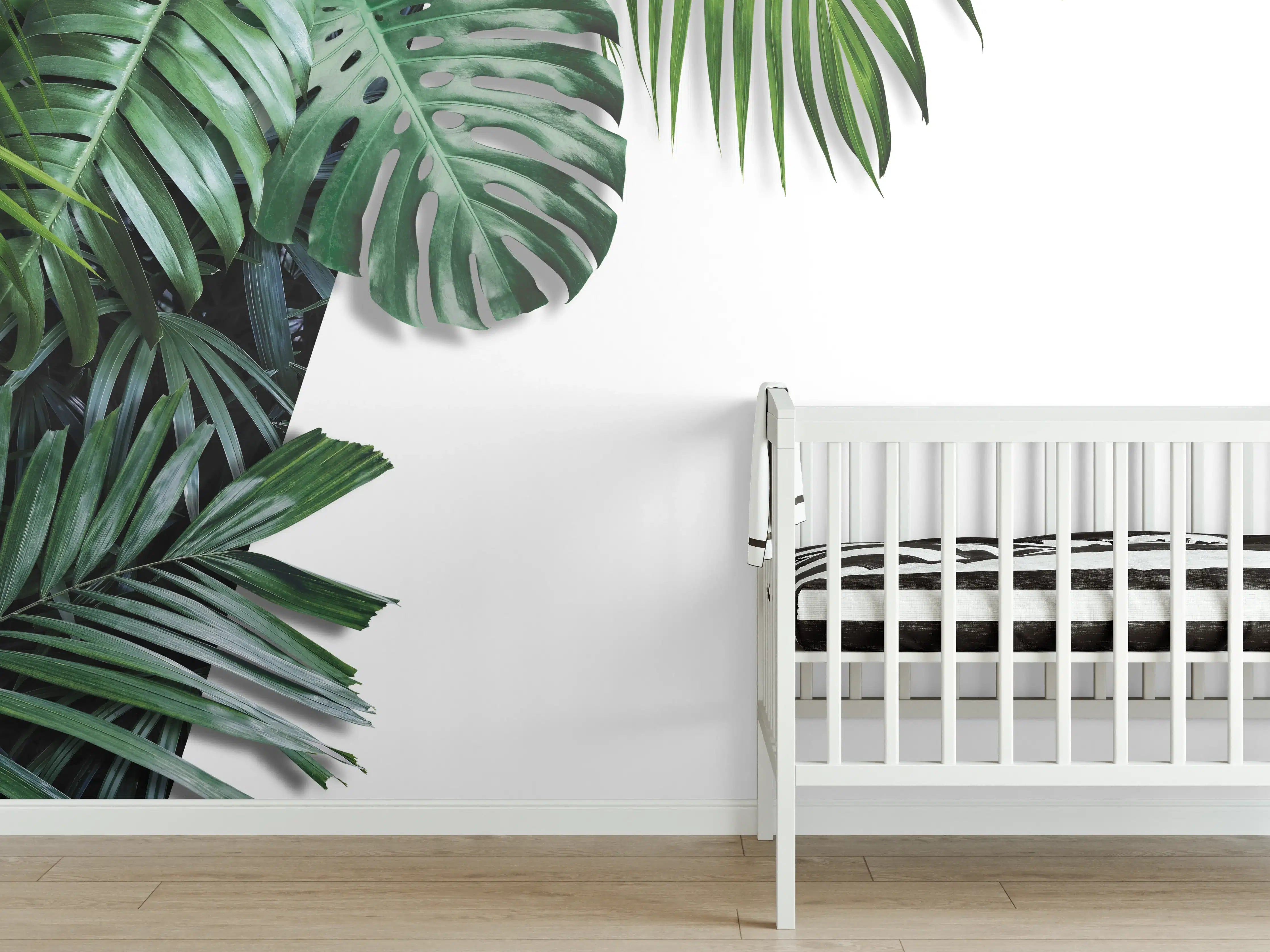 Babyzimmer Wandgestaltung - Tropische Blätter auf weißem Grund