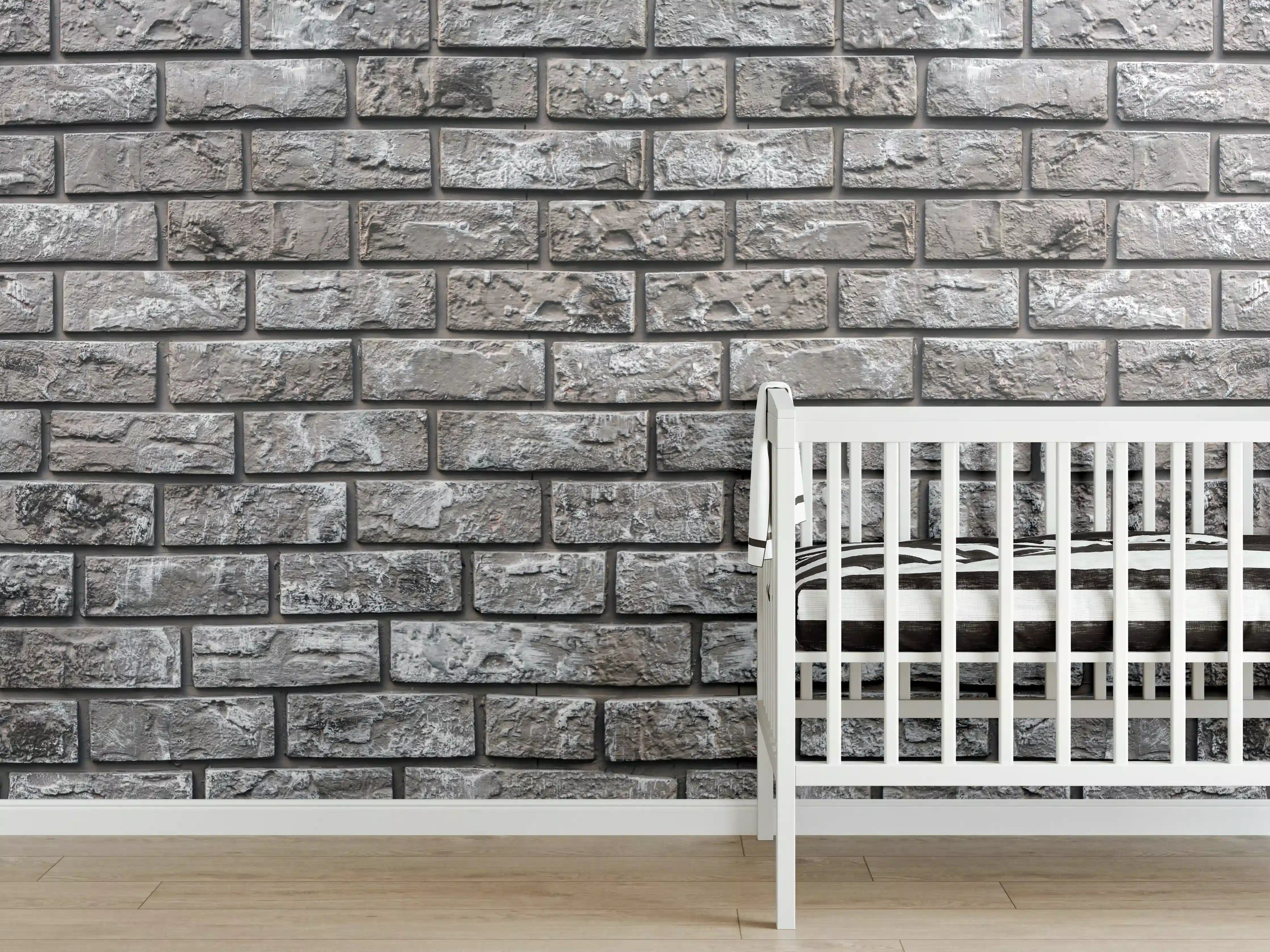 Babyzimmer Wandgestaltung - Ziegelmauer aus dekorativem grauem Stein