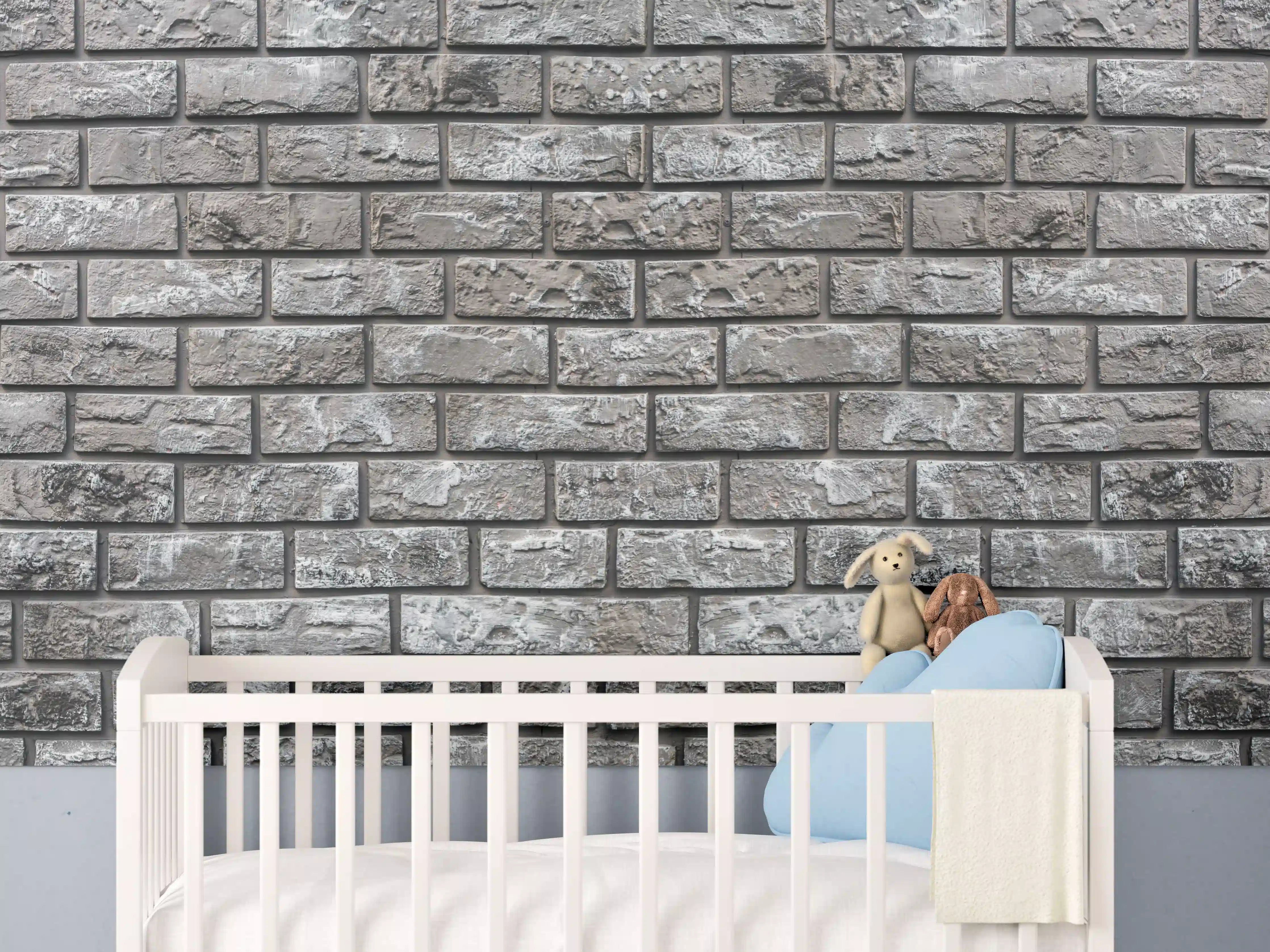 Babyzimmer Wandgestaltung - Ziegelmauer aus dekorativem grauem Stein