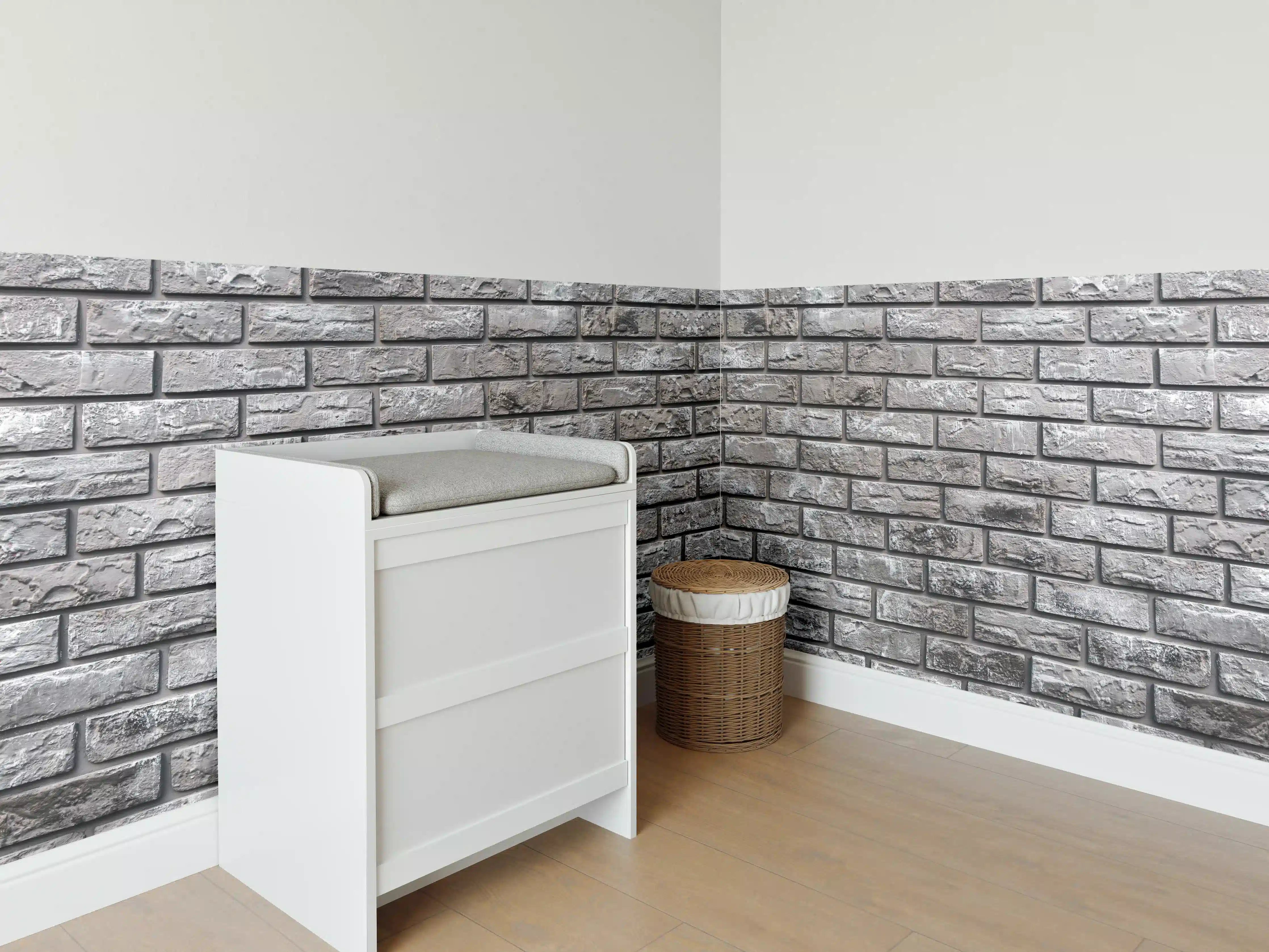 Babyzimmer Wandgestaltung - Ziegelmauer aus dekorativem grauem Stein