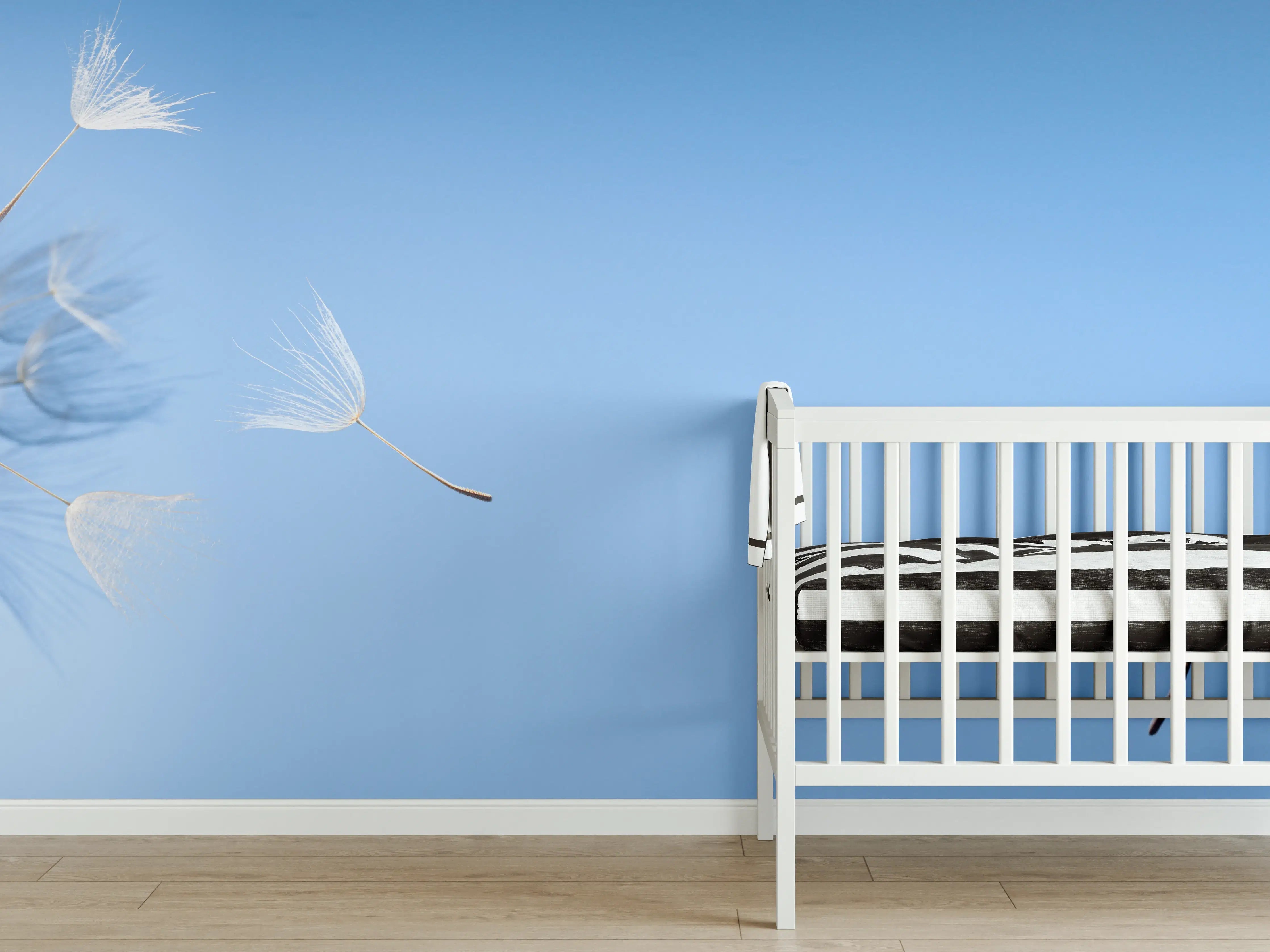 Babyzimmer Wandgestaltung - fliegende Löwenzahnsamen im Wind