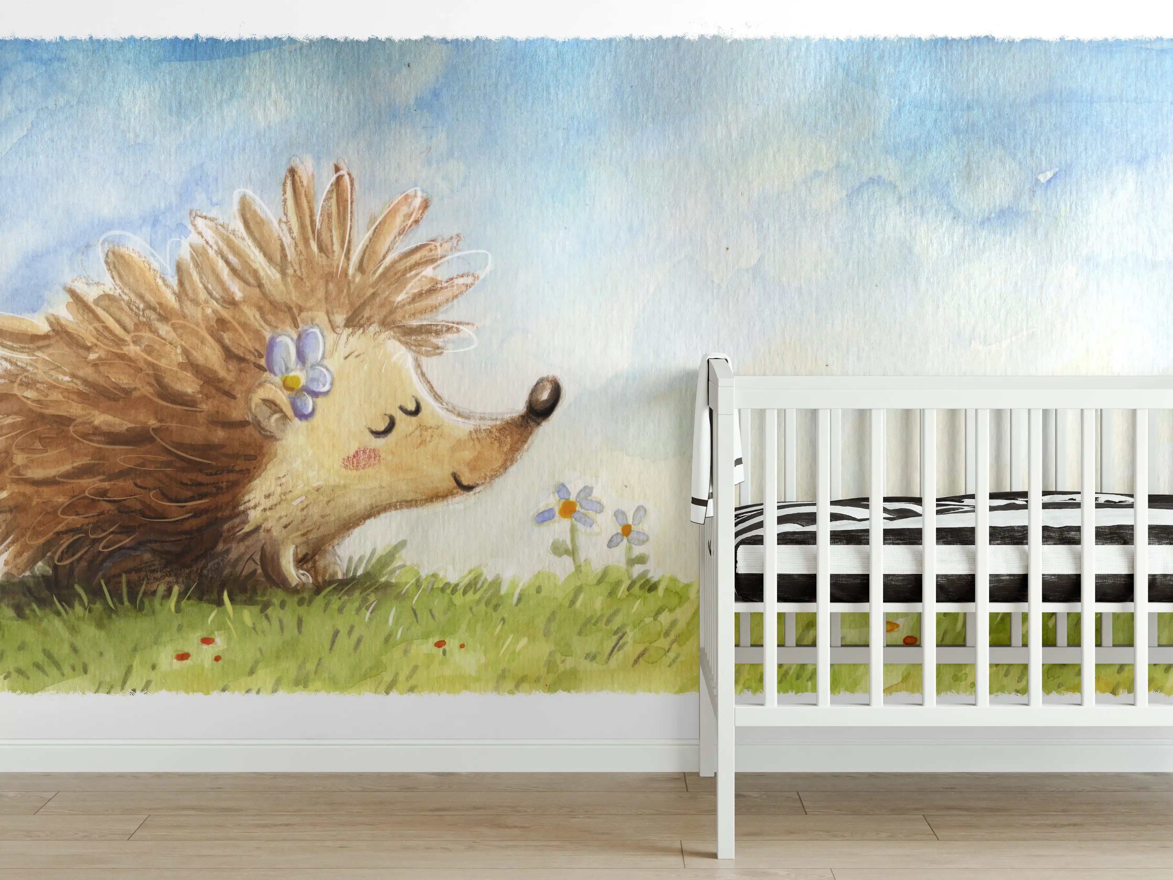 Babyzimmer Wandgestaltung - fröhlicher Igel auf einer Wiese