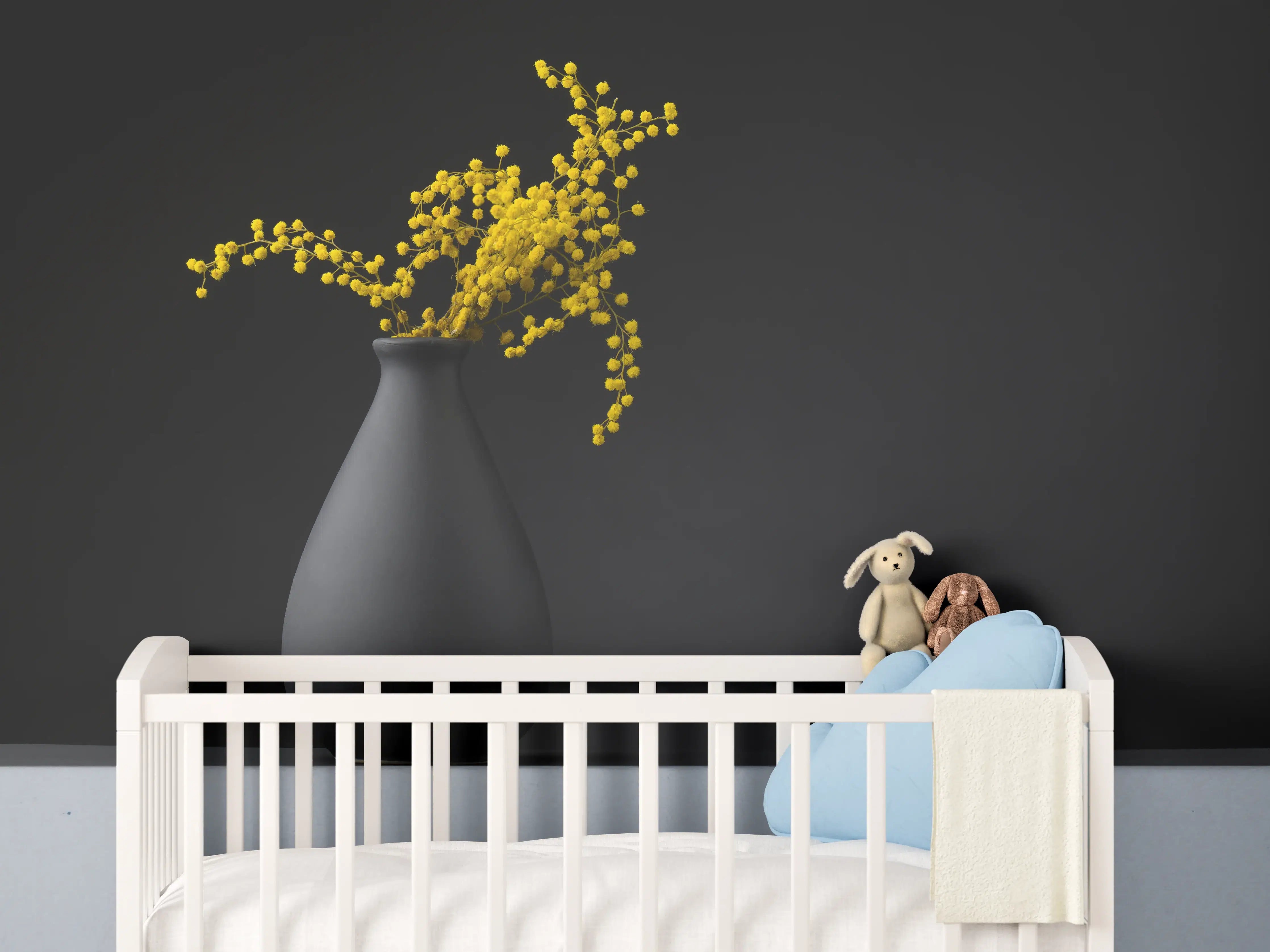 Babyzimmer Wandgestaltung - gelbe Blume auf der gräulichen Vase