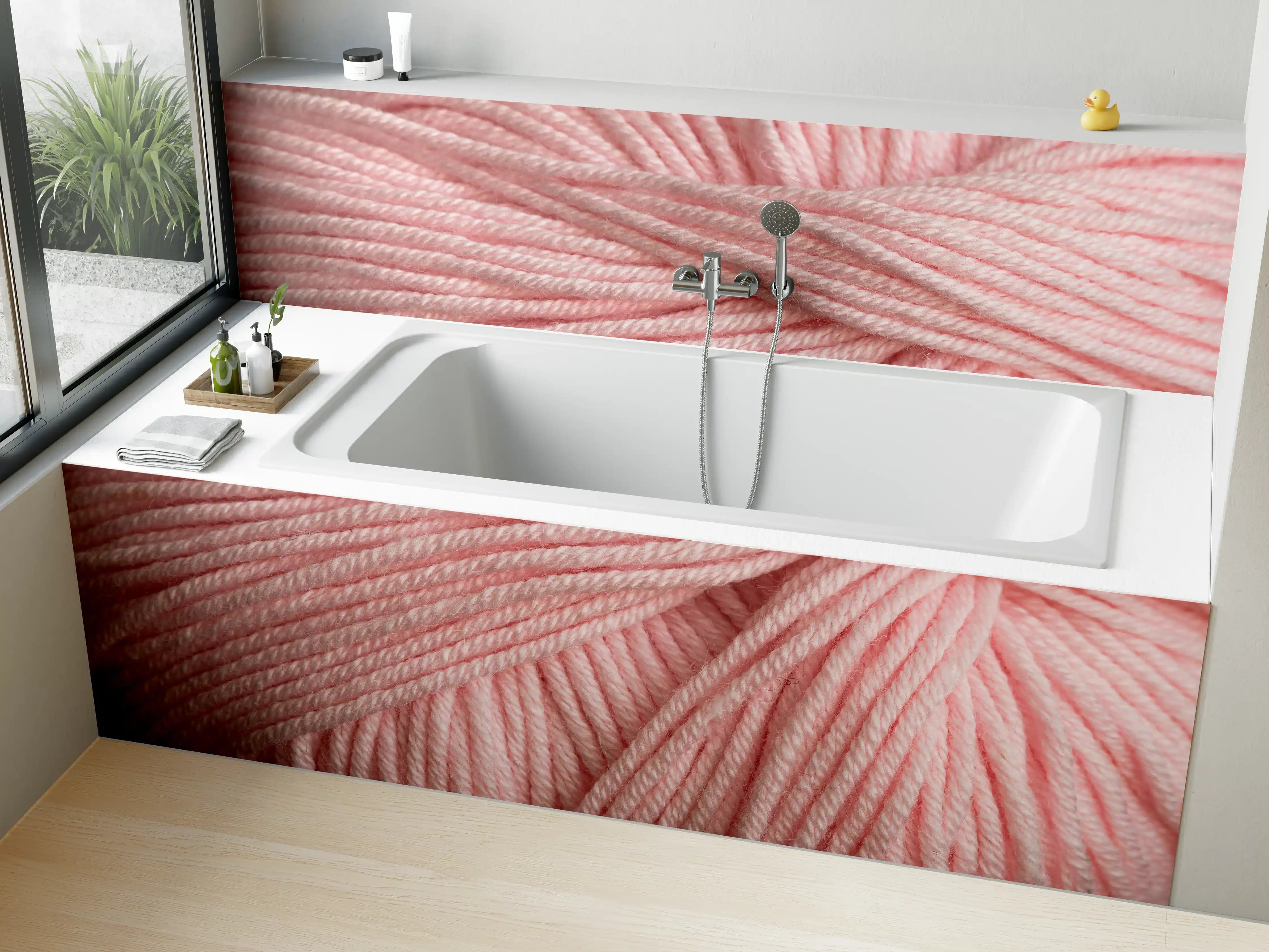 Badewannen-Rückwand - Nahaufnahme eines rosa Garnknäuels