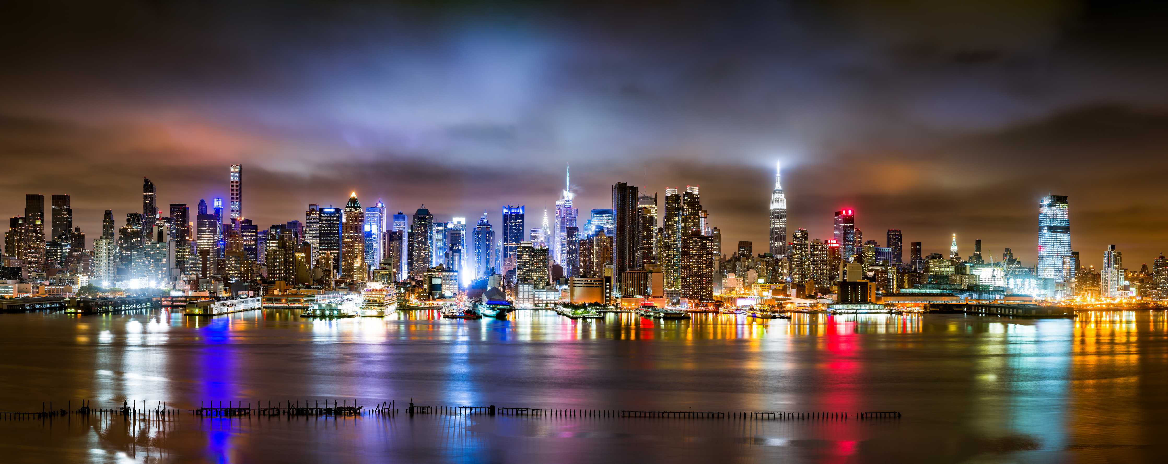 Büro Wandgestaltung-Manhattan Skyline im nächtlichen Panorama