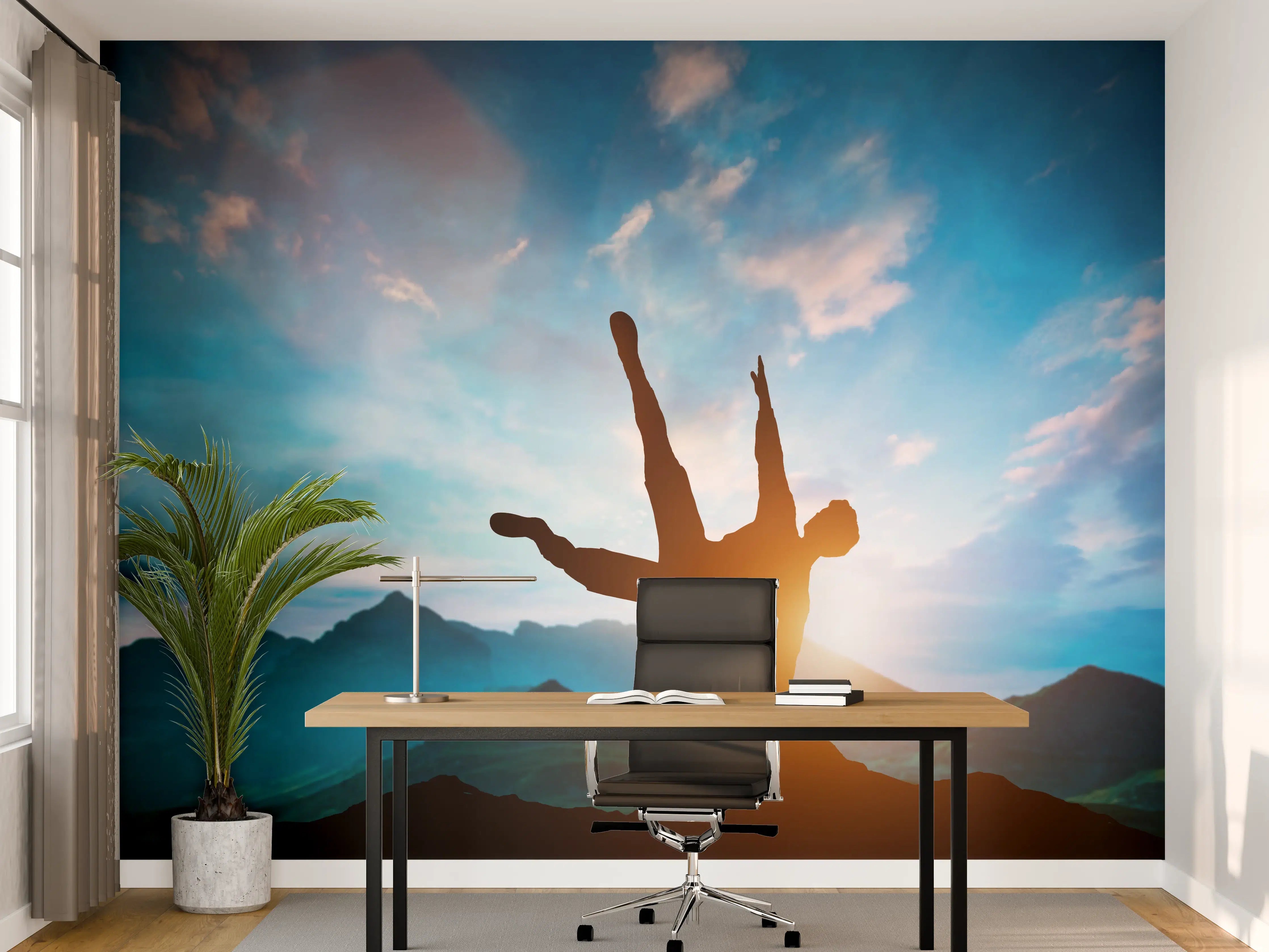 Büro Wandgestaltung - Parkour Aktion in den Bergen über Felsen.